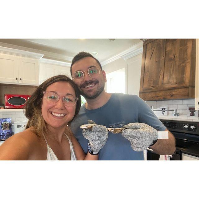 At home oyster shucking. One of our favorite date nights!