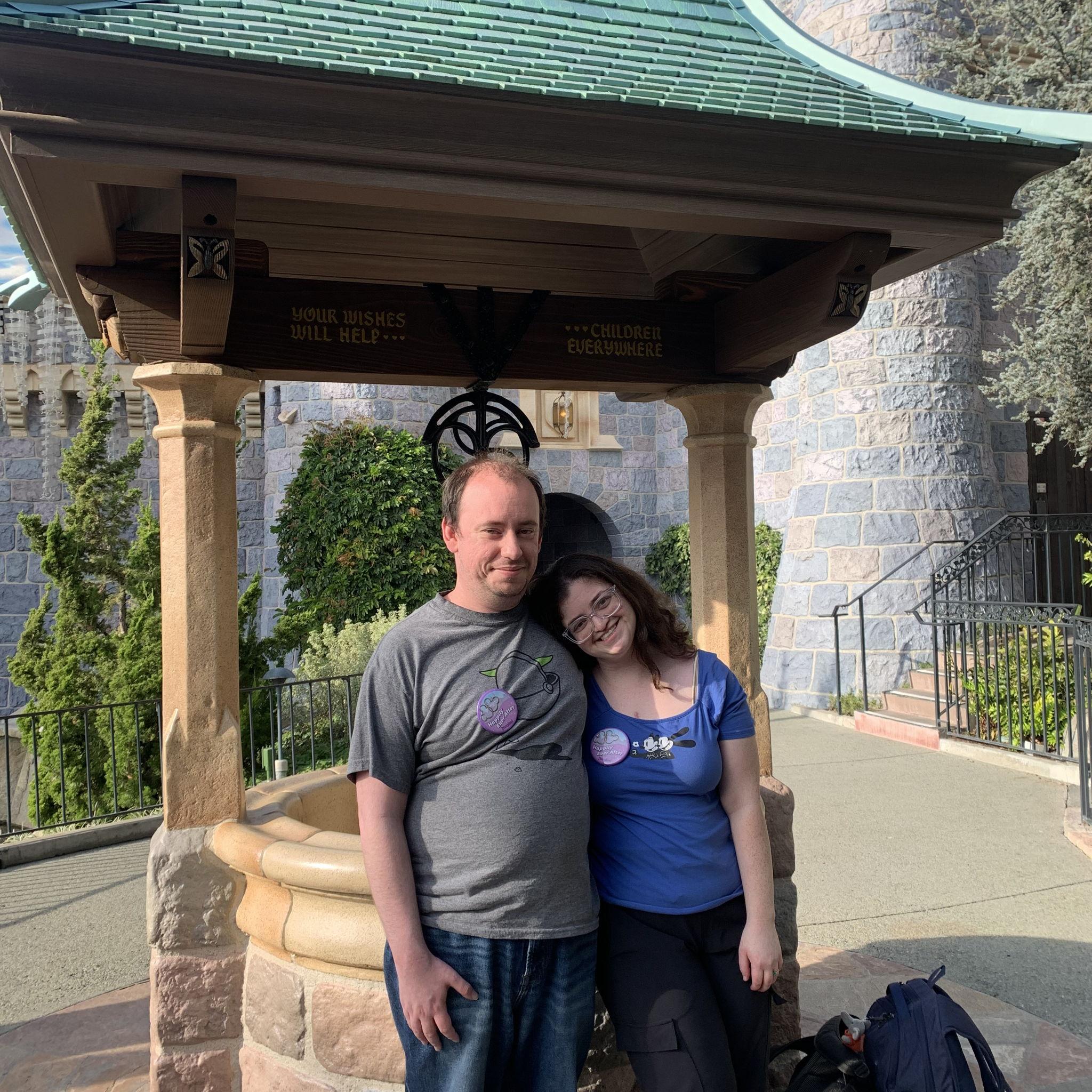 6 years at Disneyland! The buttons say 'Happily Ever After'