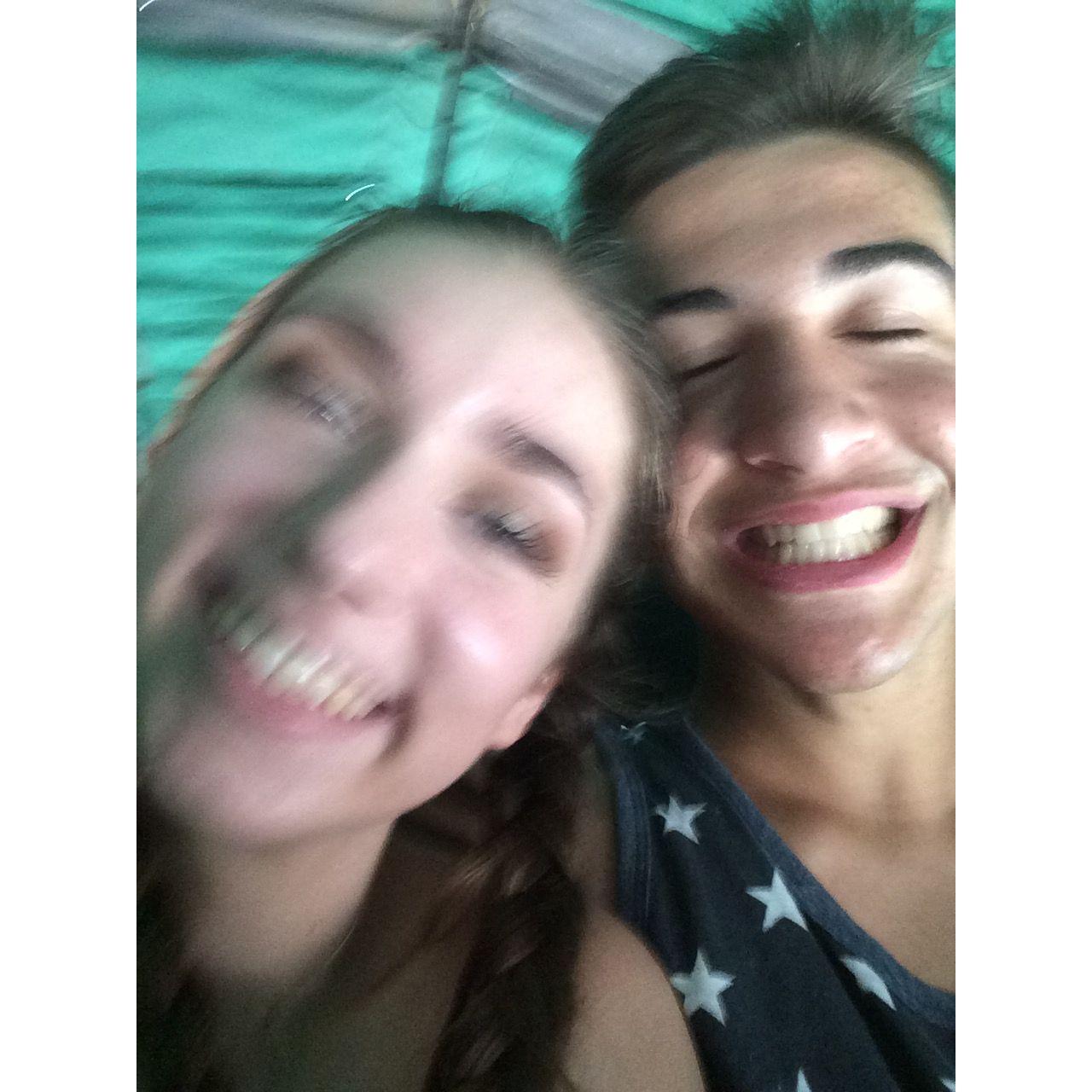 Our blurry first picture together on the "caterpillar" kiddie ride. (Did not end well for Jared's stomach..)