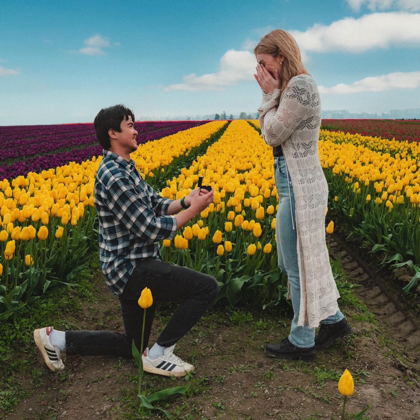 Calvin asked Amber to marry him at the Skagit Valley Tulip Festival! We were setting up the camera to take some couple photos when he got down and popped the question! with the sweeeetest speech