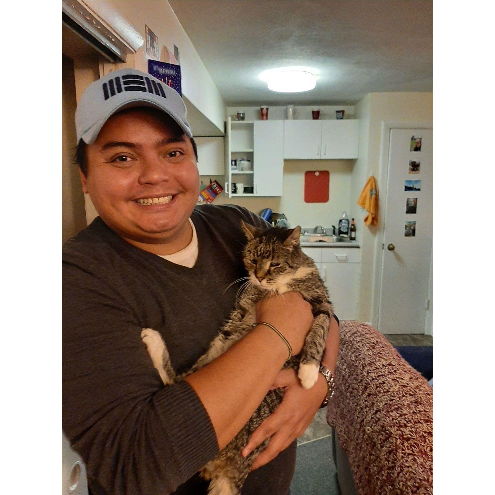 Mike with Anne's OG fur baby, Cayden. October 2021.