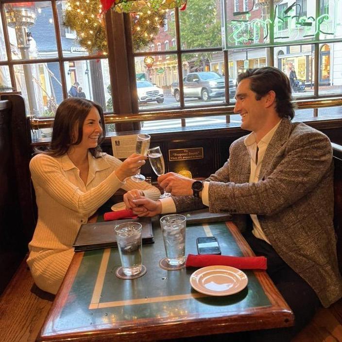 Moments after we got engaged! Celebrating at the "The Proposal Booth" at Martin's Tavern with chicken tenders and fries, of course! - November 2023