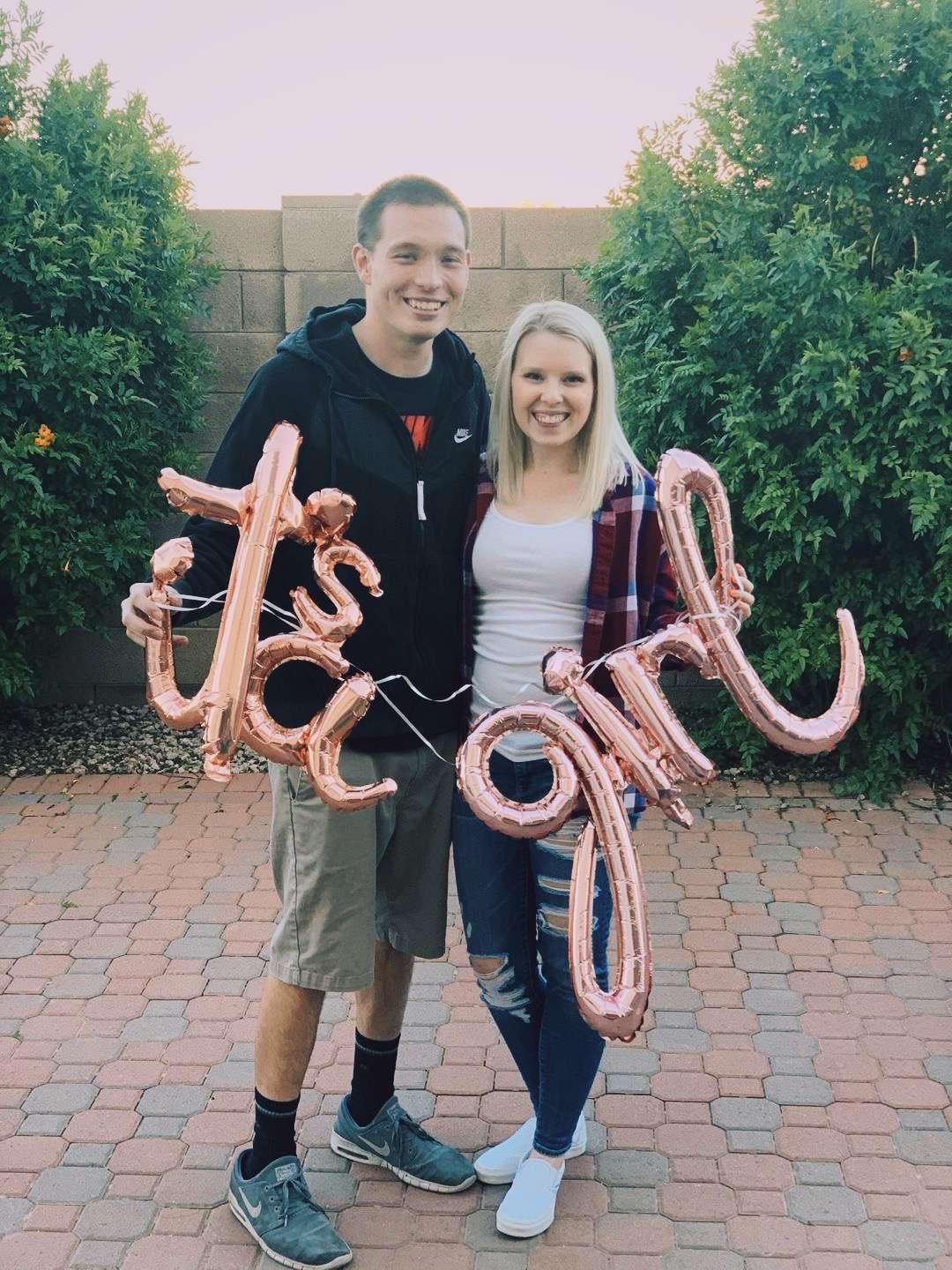 If you know us, we don't do traditional! We found out in January 2020 we were expecting our first daughter, Olivia!