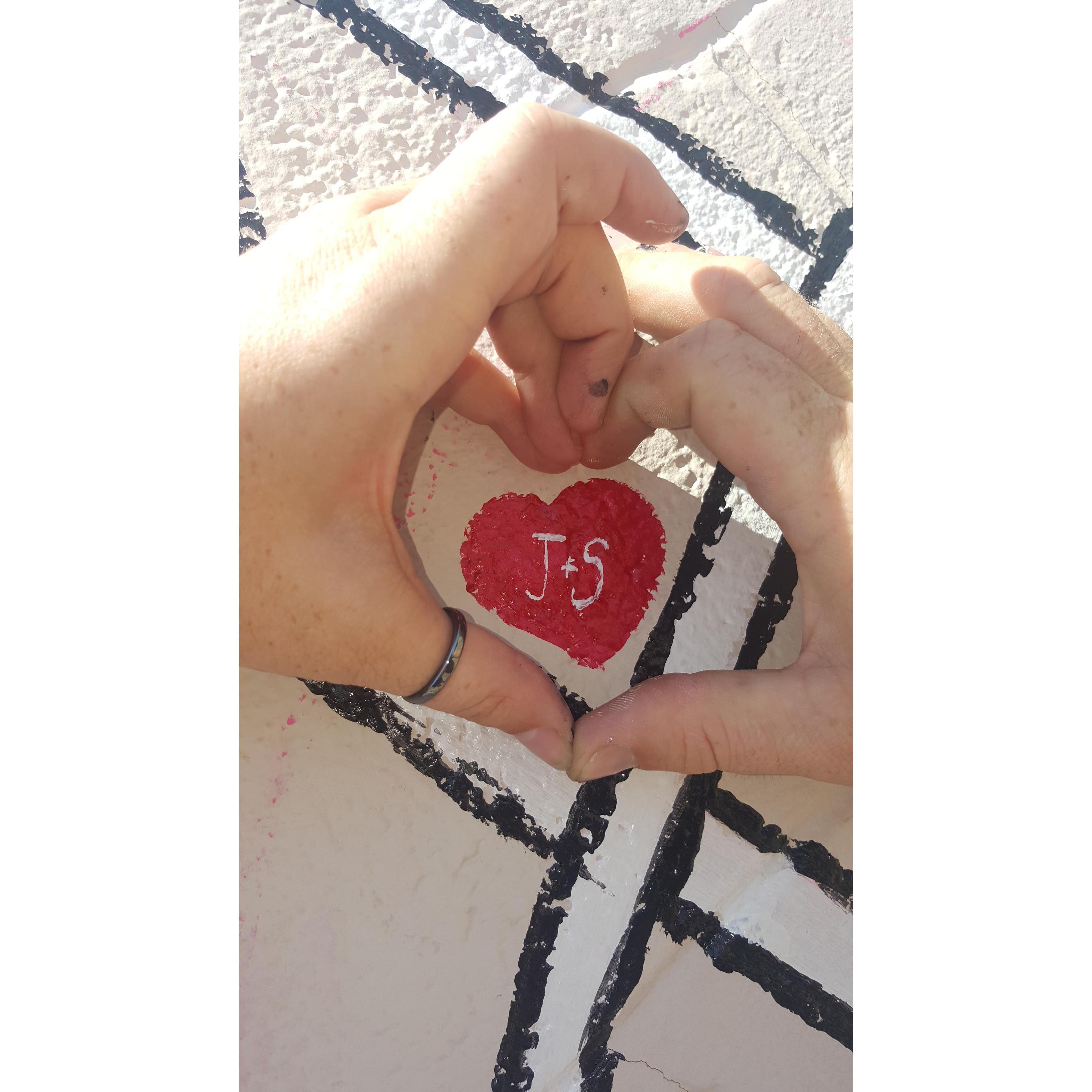 We painted the "I love you with all my heart" mural at Val's and there's hearts like this all over it for different couples in town. 2017