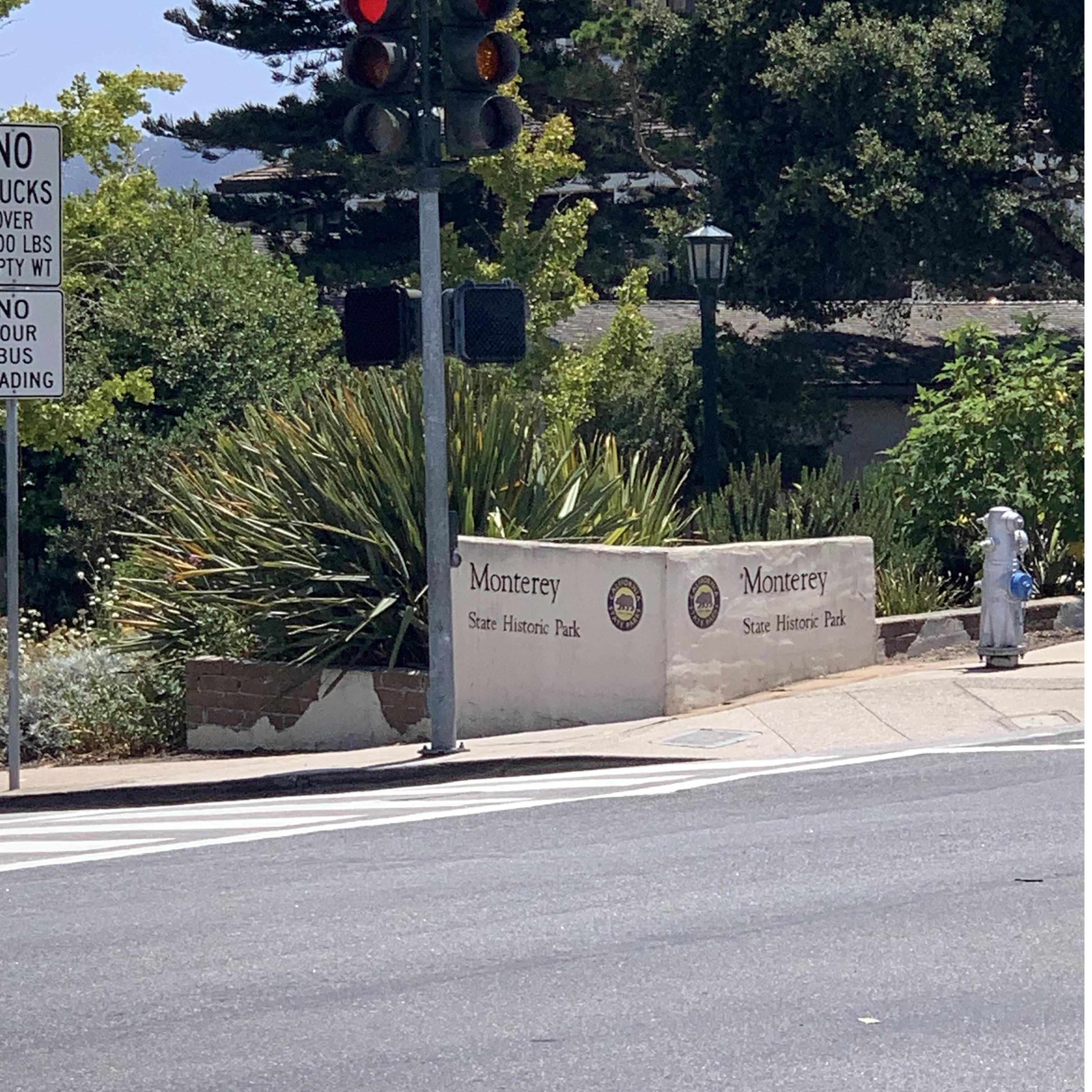 Look for this sign to find the venue, Memory Garden! A quick walk past this sign and down some stairs, you'll see our welcome sign.