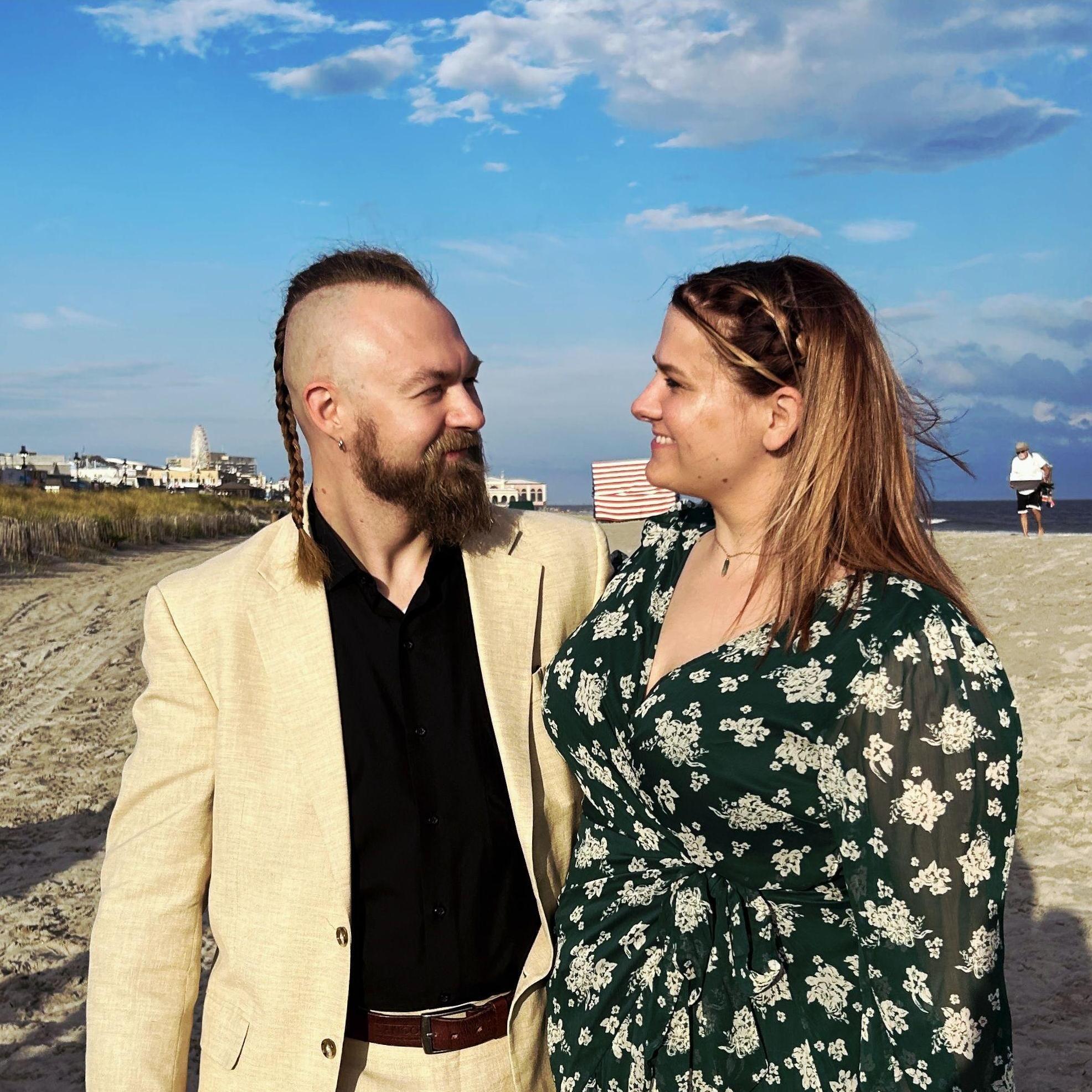 Dressed up, sandy toes, and stealing smiles—celebrating love at Andy & Victoria’s wedding.