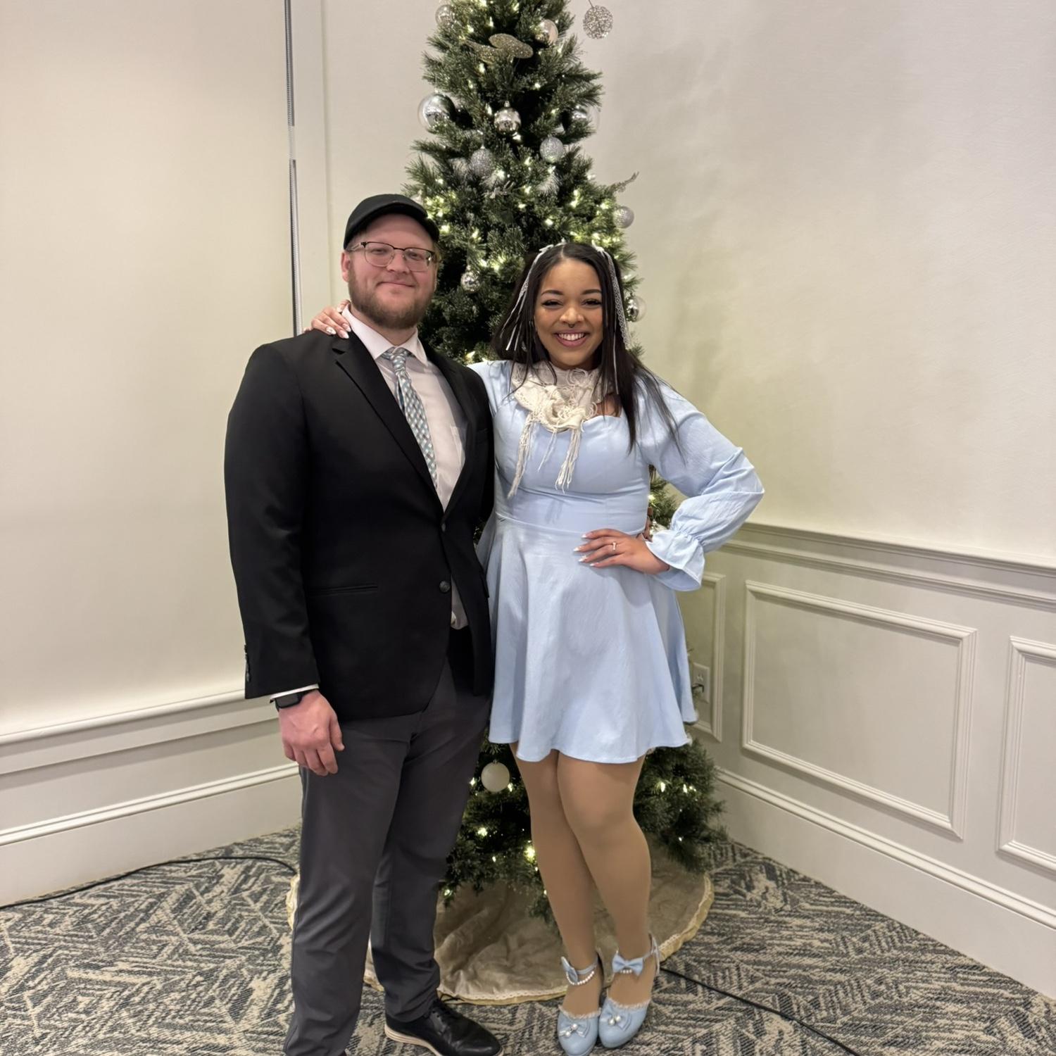 at Cody’s cousin’s wedding in december of 2024. his tie made his blue eyes POP! 🤩