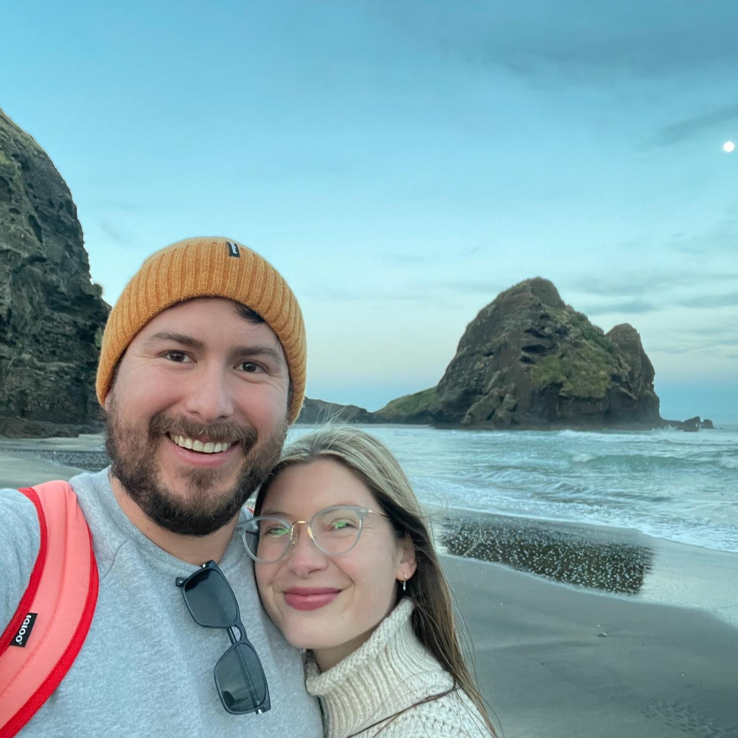2024: After getting engaged in Austin, we took a vacation to explore New Zealand’s North Island.The upside of jet lag is that we were awake at dawn to enjoy the sunrise at a beach in Waitakere!