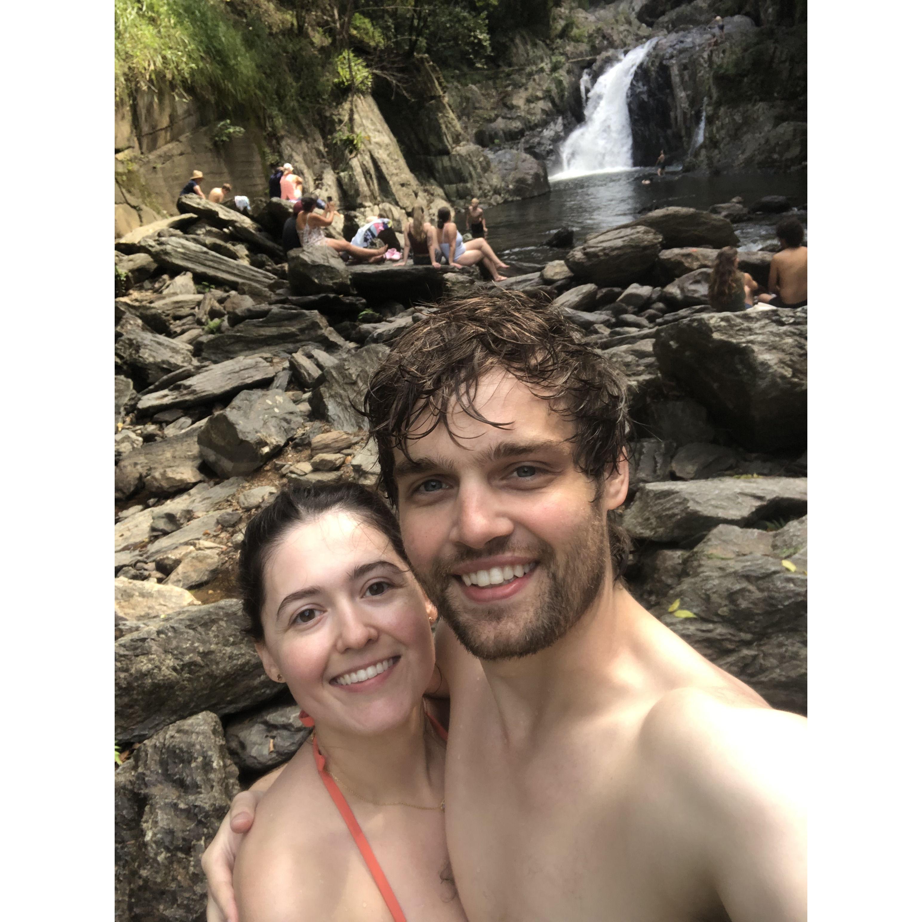 Our last day in Cairns, Australia after we swam in the waterfall behind us!