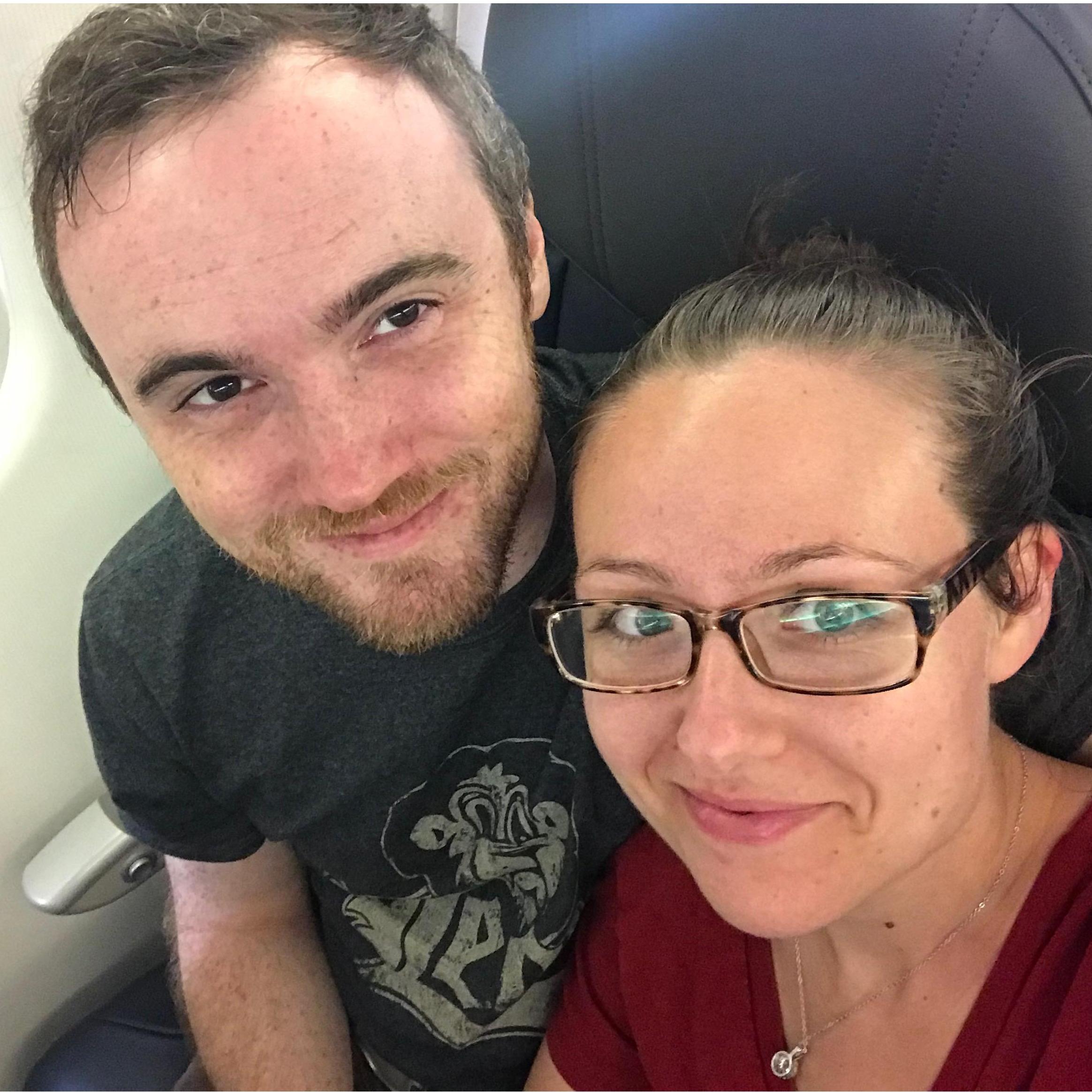 The happy couple flying who-knows-where, because they can't seem to keep their feet on the ground.
(Jason & Sarah Brady)