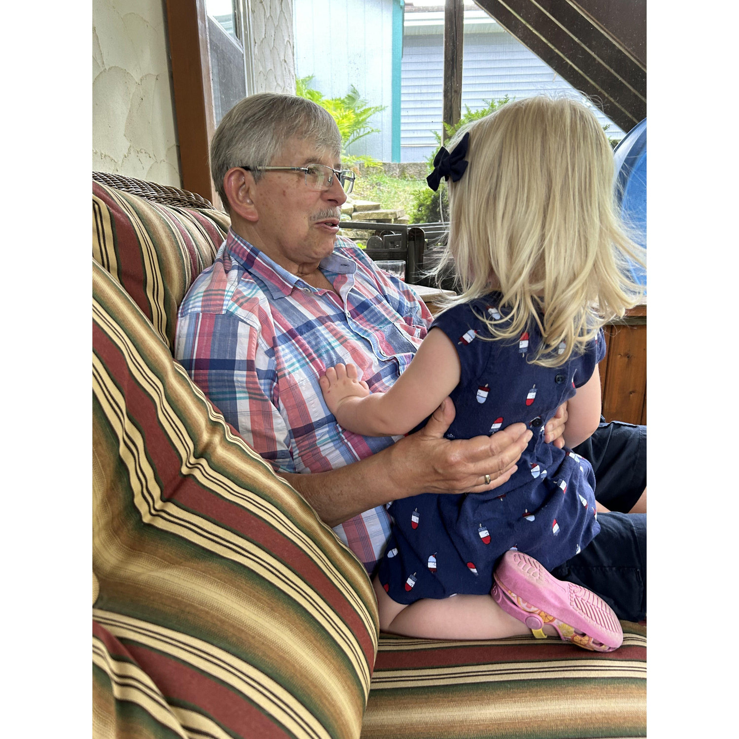 Sweet moment with Chris' granddaughter