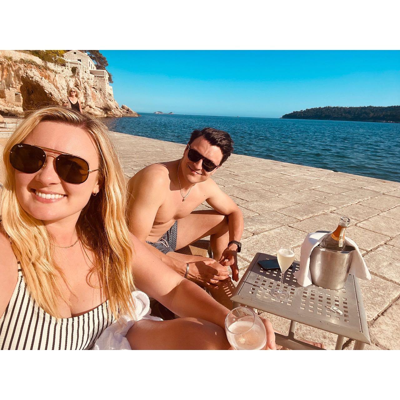 Enjoying the view and some bubbles at our hotel in Croatia.