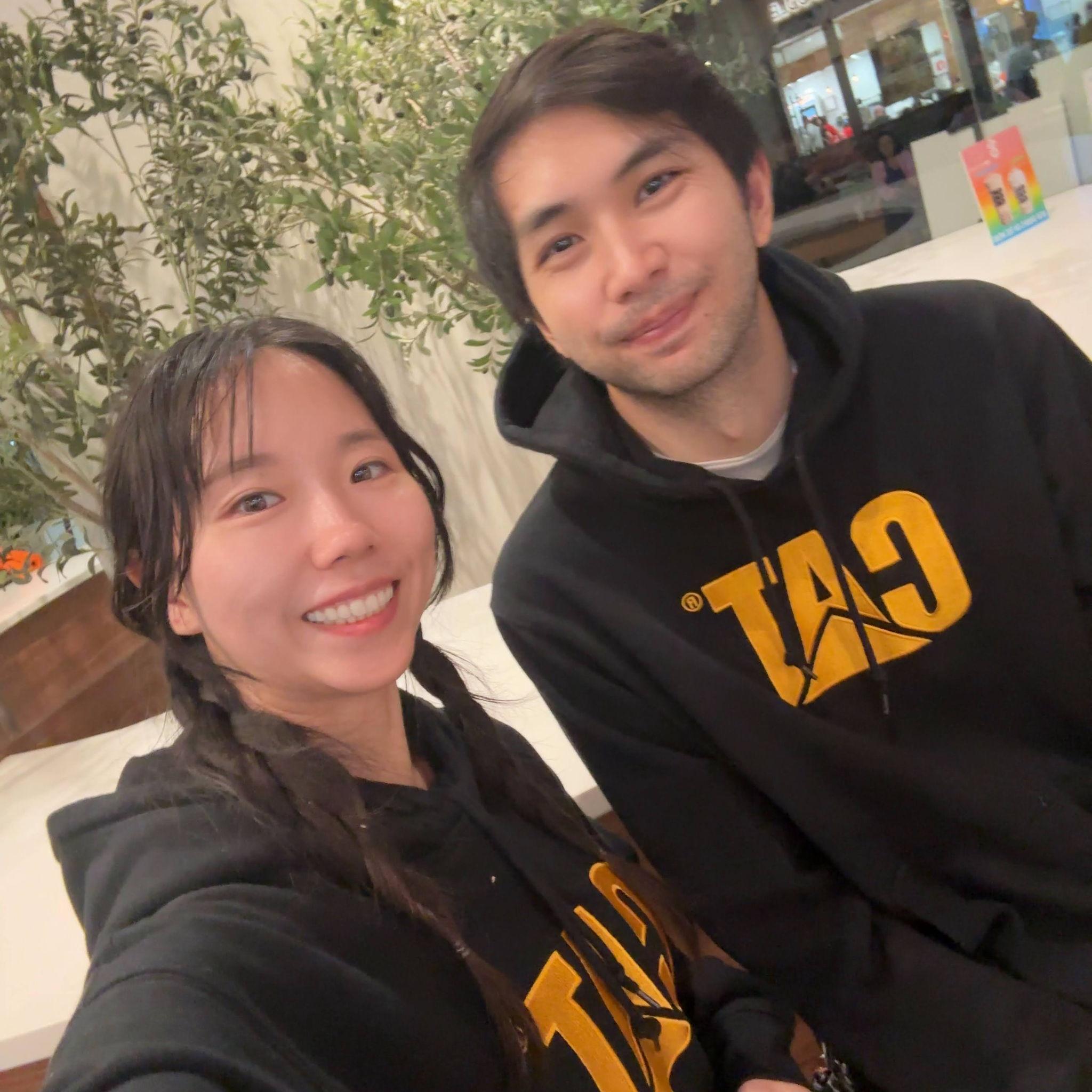 Boba runs in matching hoodies