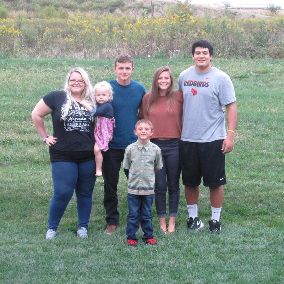 The first of many family pictures Nate was a part of. He quickly learned how often mom made us take these!