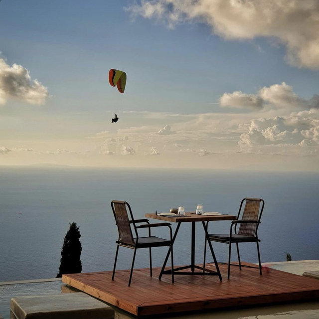 Cliff-side dinner in Greece
