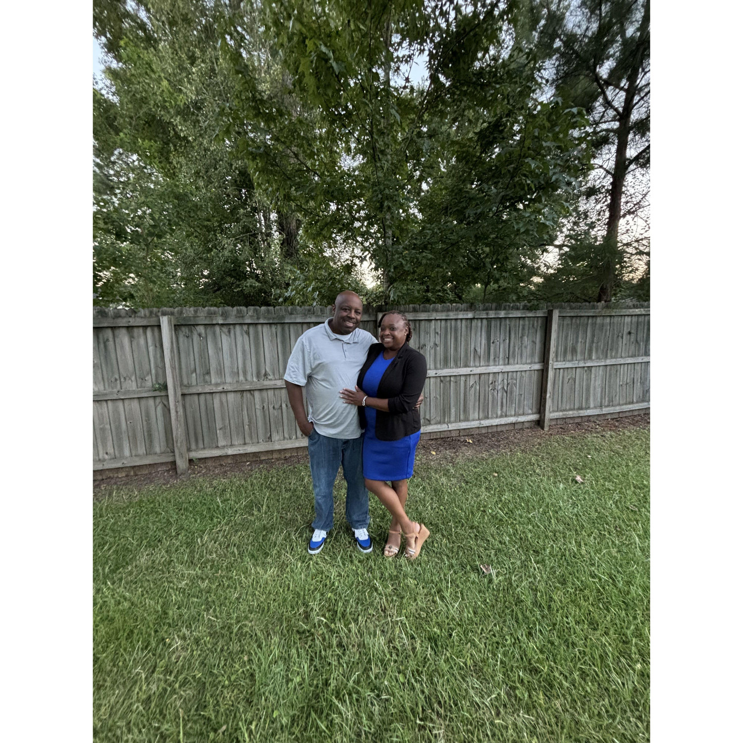 In the back yard playing around. We thought we were cute because we were matching.