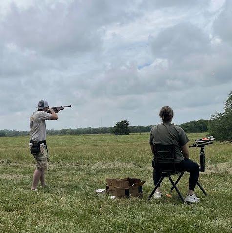 Shooting trap together. We're both VERY competitive about it.