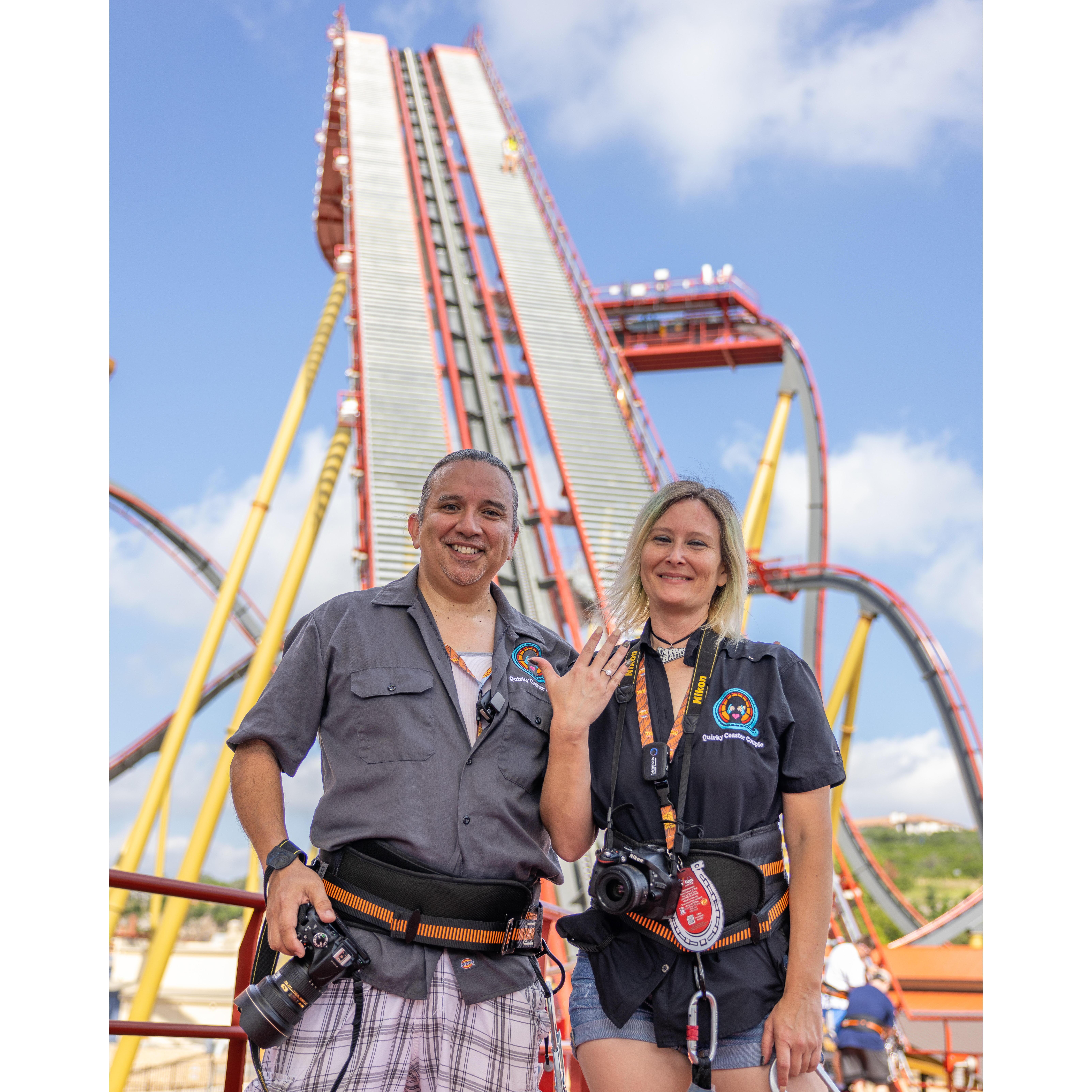 Our first photo as an engaged couple taken by our friend Jonathan aka MCoasterCo. That coaster behind us is where Nick proposed all the way at the top. We climbed all of them stairs!