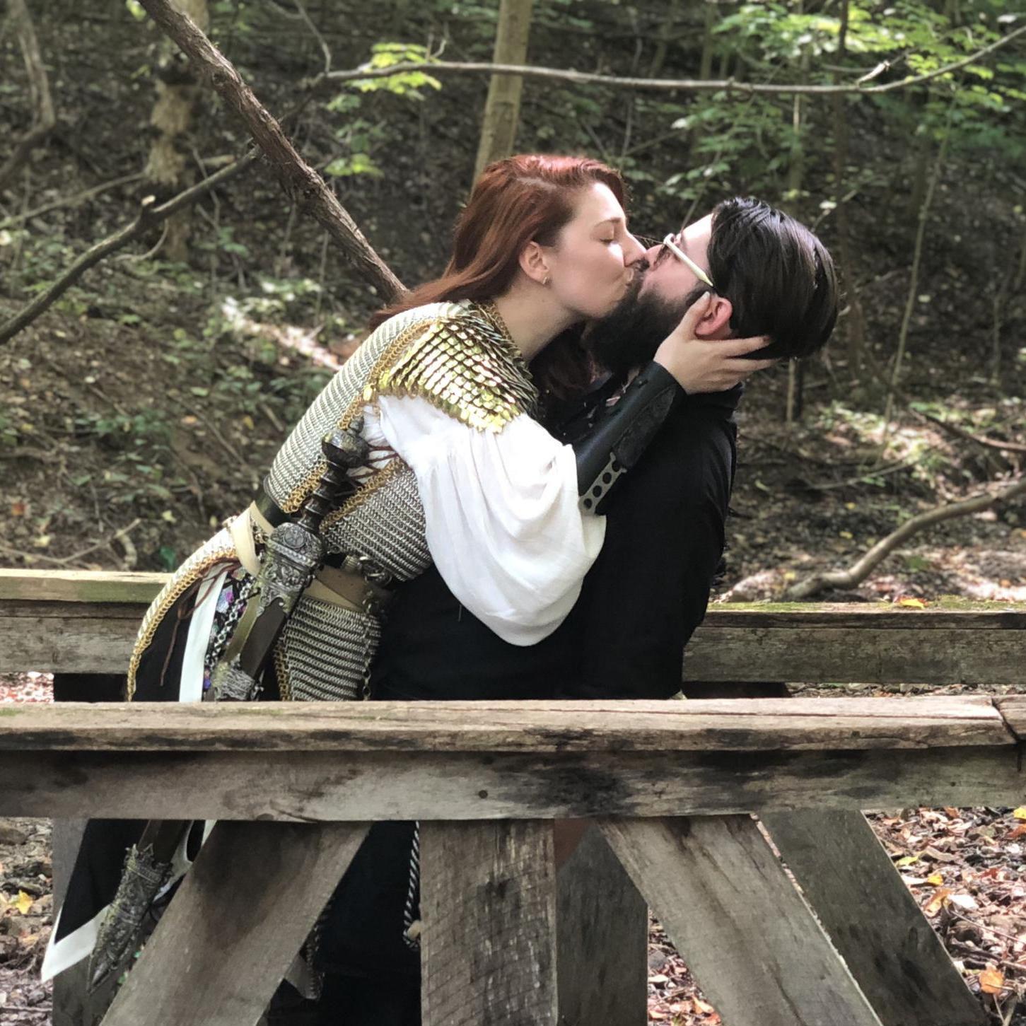 A knight kissing her prince on the Kissing Bridge.