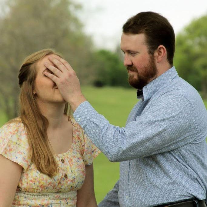 The Photographer said to hold her face