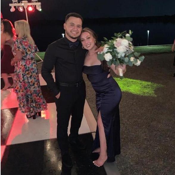 One of the MANY times we both caught the bouquet and garter