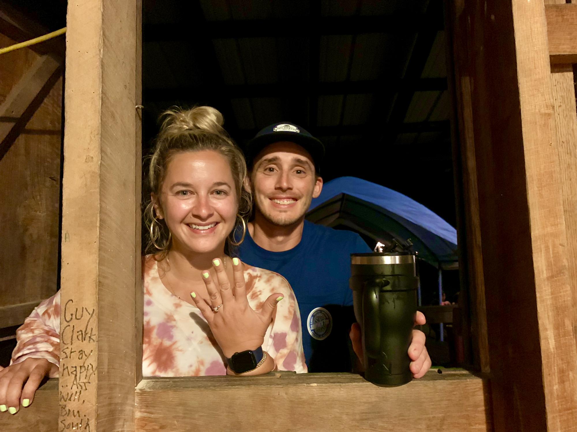 we’re engaged! brad popped the question on the back porch of the library at camp greenbrier house party