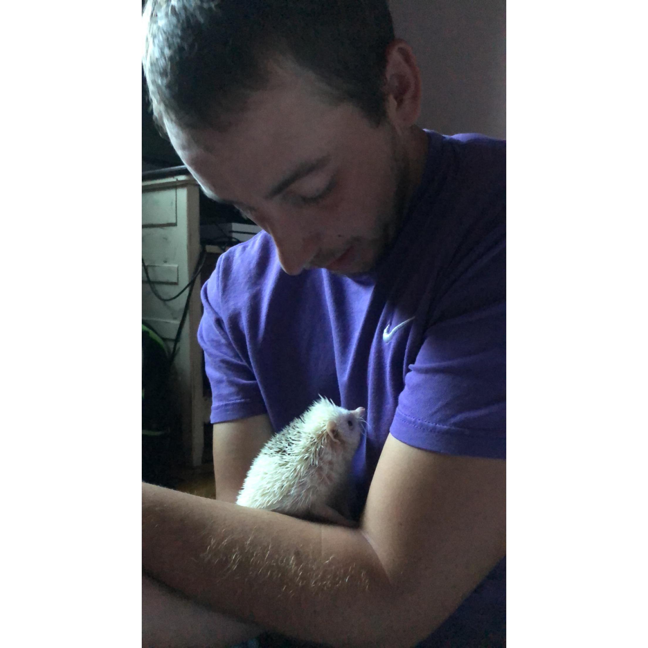 Our hedgehog, Atlas, with his favorite parent! -A