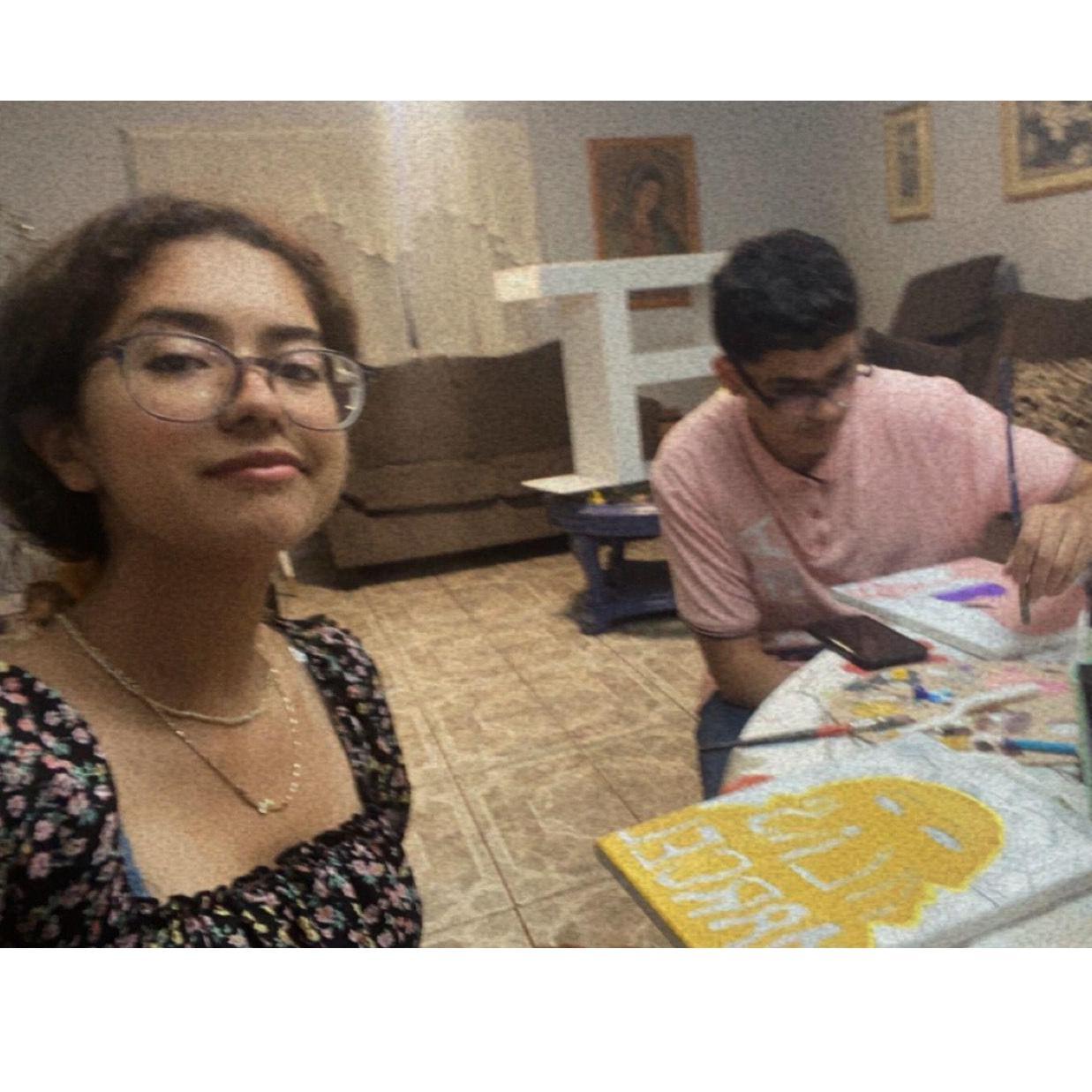 This was us on our 4th date we just made it official. Originally we were going to be outside but it stared raining so we stayed inside and painted