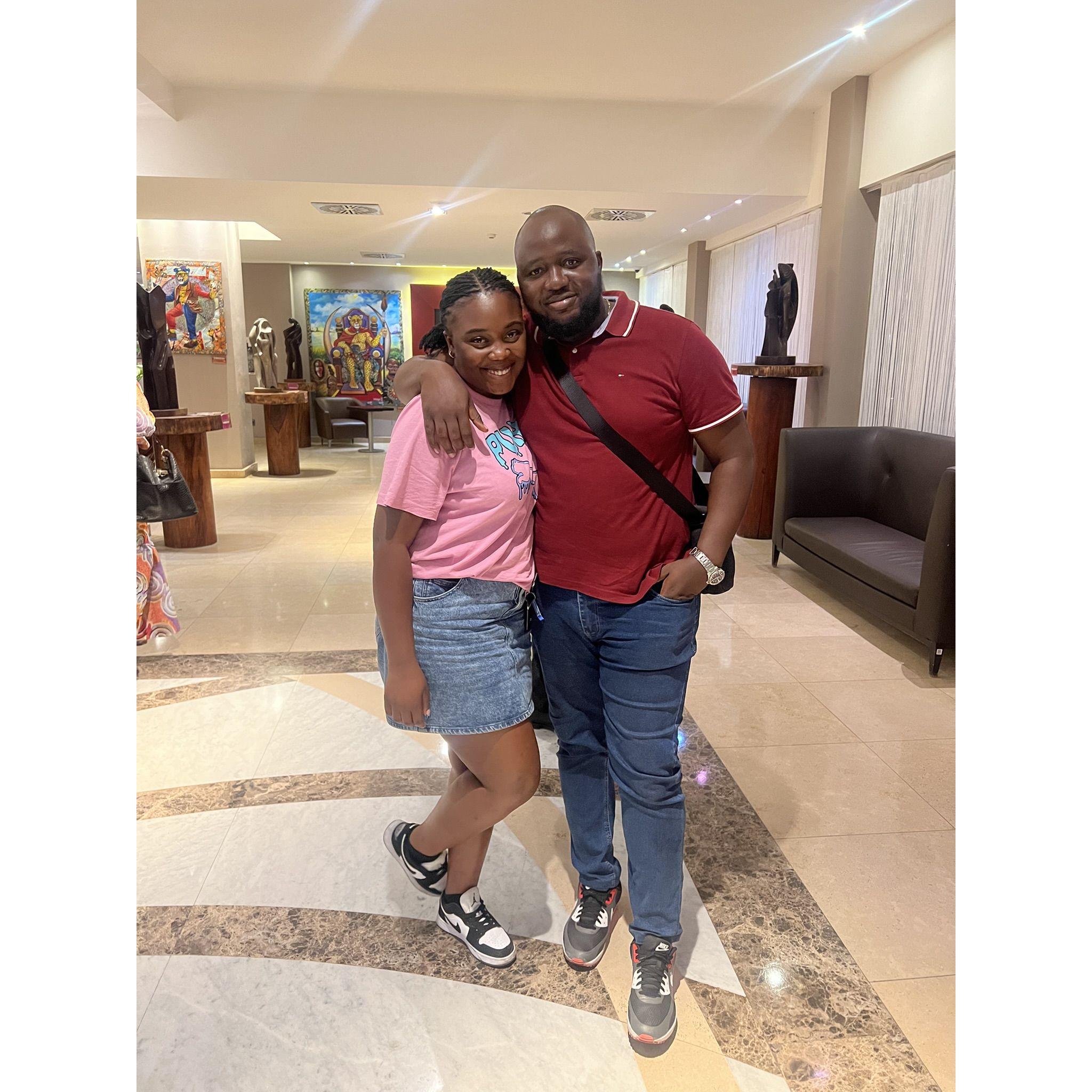 Taniah travels to Kinshasa for the first time as his girlfriend.