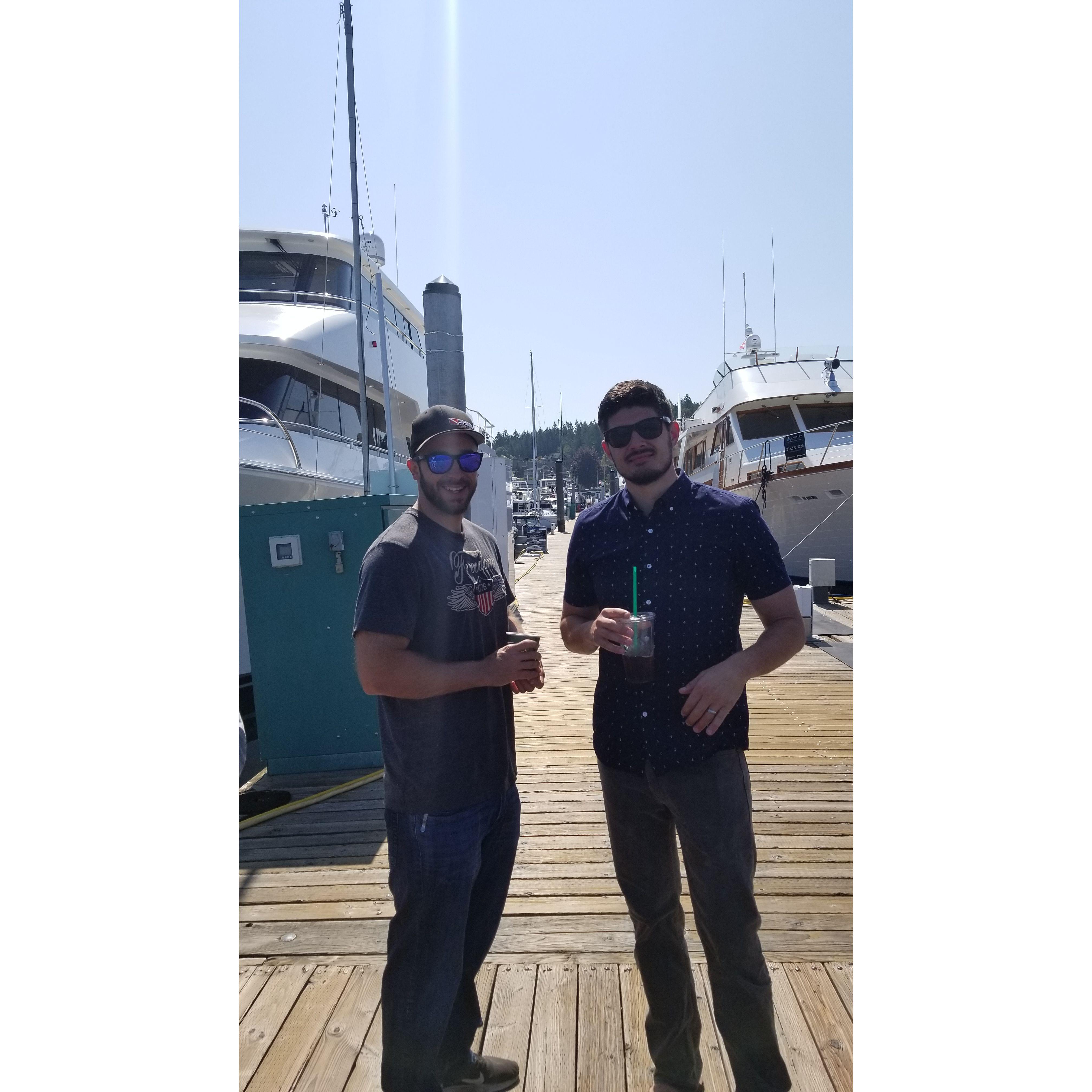 The boys walking the docks with their Starbucks!