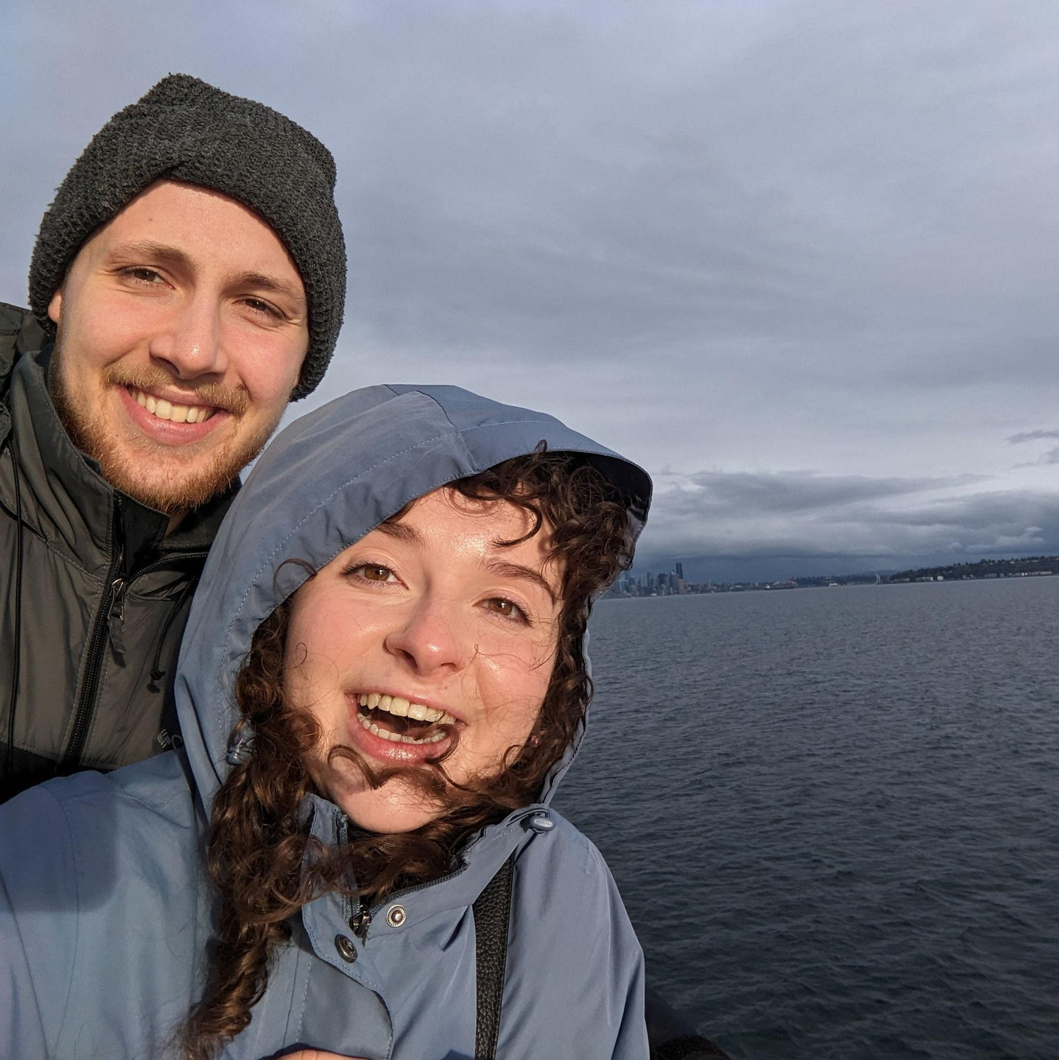 2/2025: Many cozy hangouts and adventurous dates followed; here, on a ferry on a whirlwind day trip to Seattle, tiny in the distance, a surprise for Addie’s birthday.