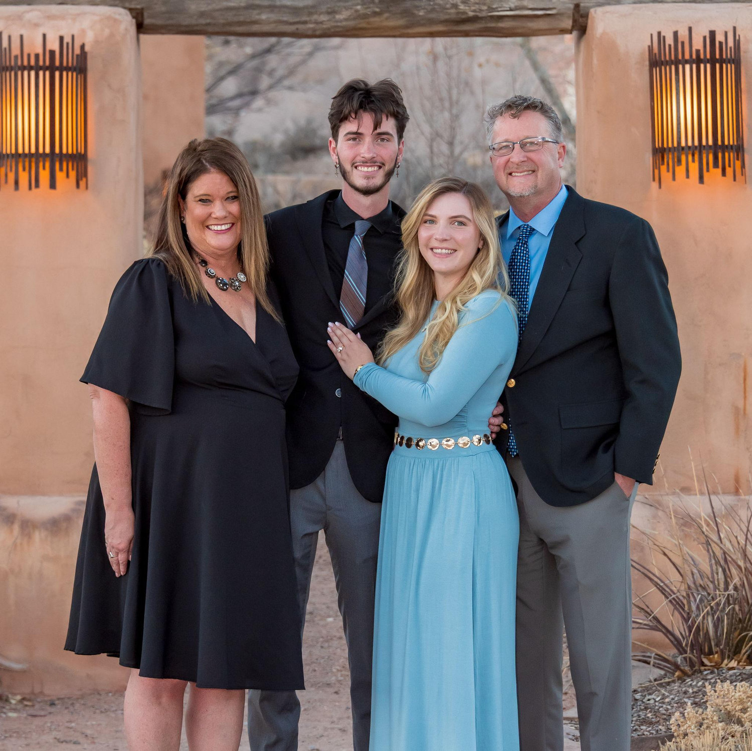 Katie and Spencer with Heather and David Laughlin (mother and father of the groom). Ojo Caliente, NM. December 13, 2025