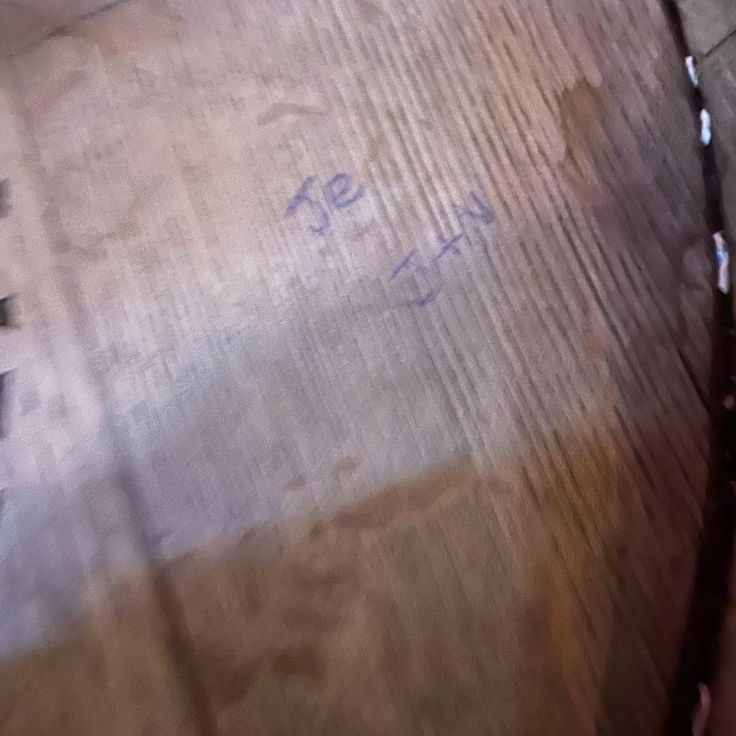The night Nick and Jenn met Nick wrote J+N into the table.