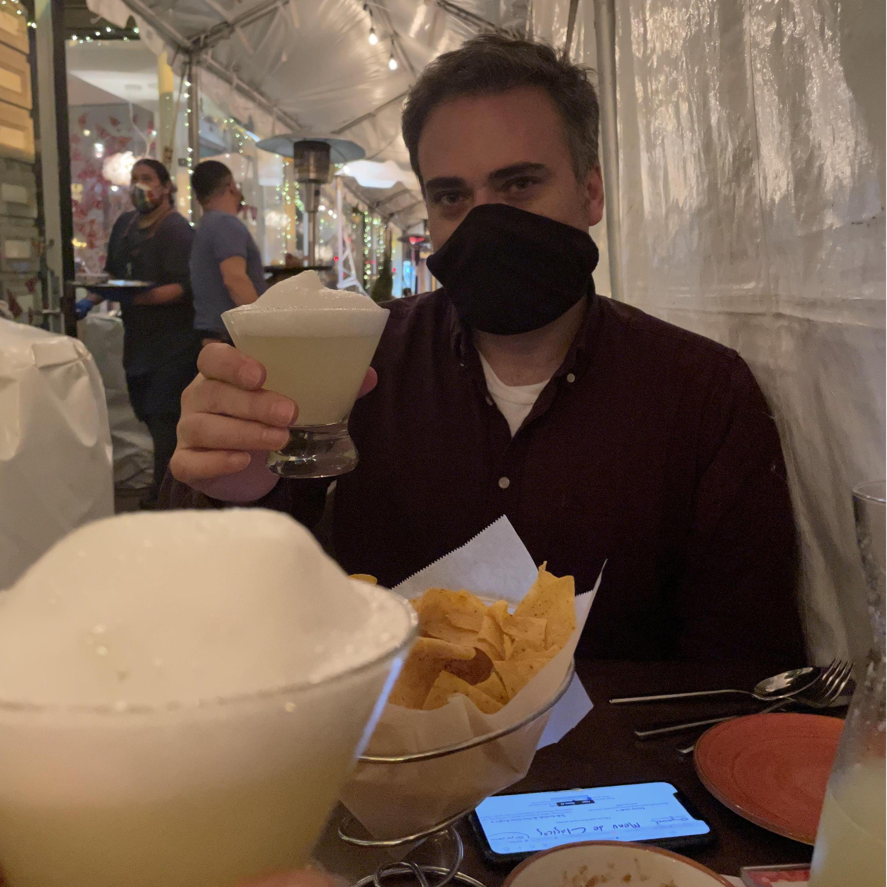 Masks, outdoor seating with heaters, and social distancing at Oyamel