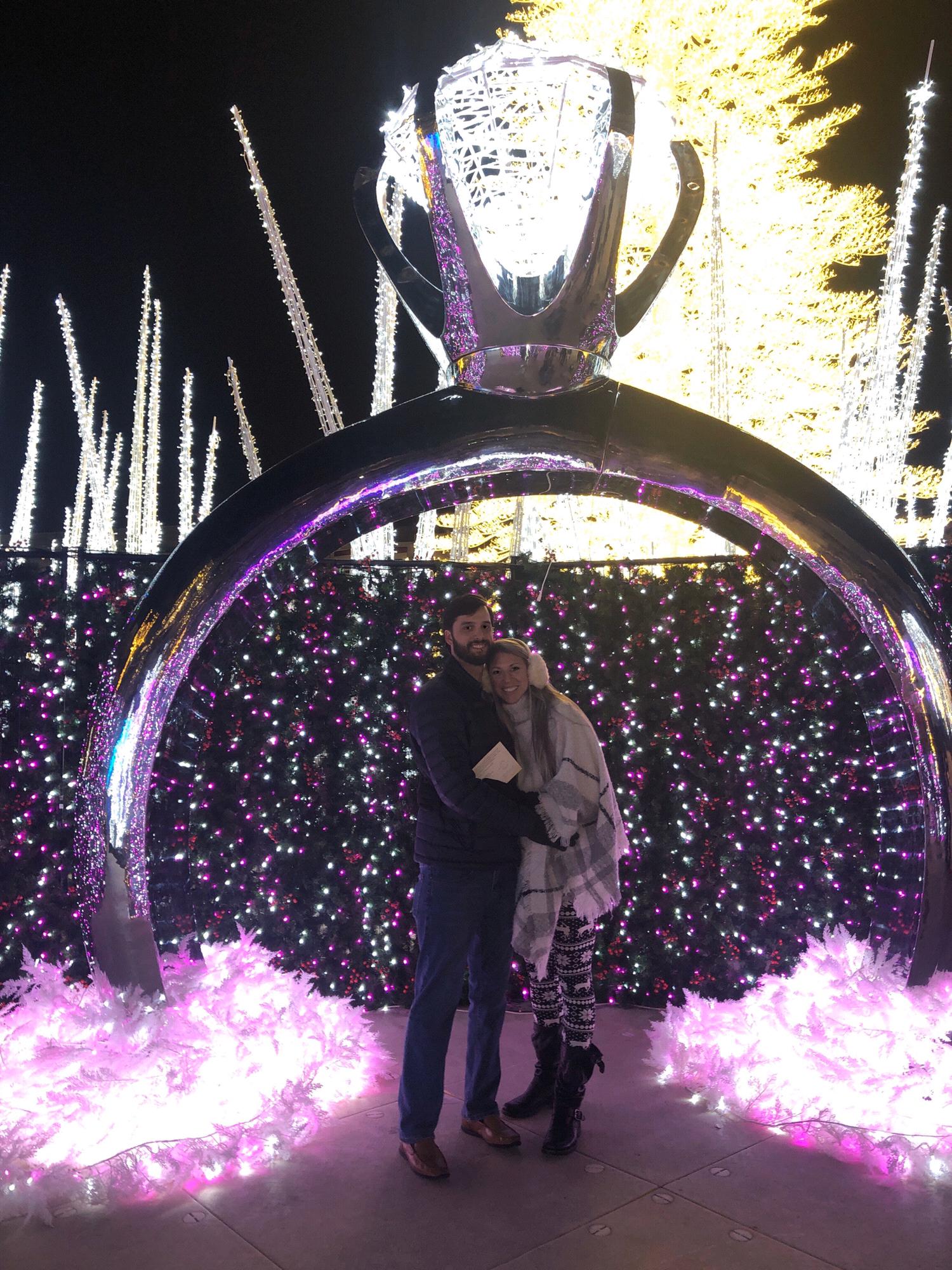 The engagement ring in the Enchant park I made Tyler pose in front of (with my ring in his pocket!)