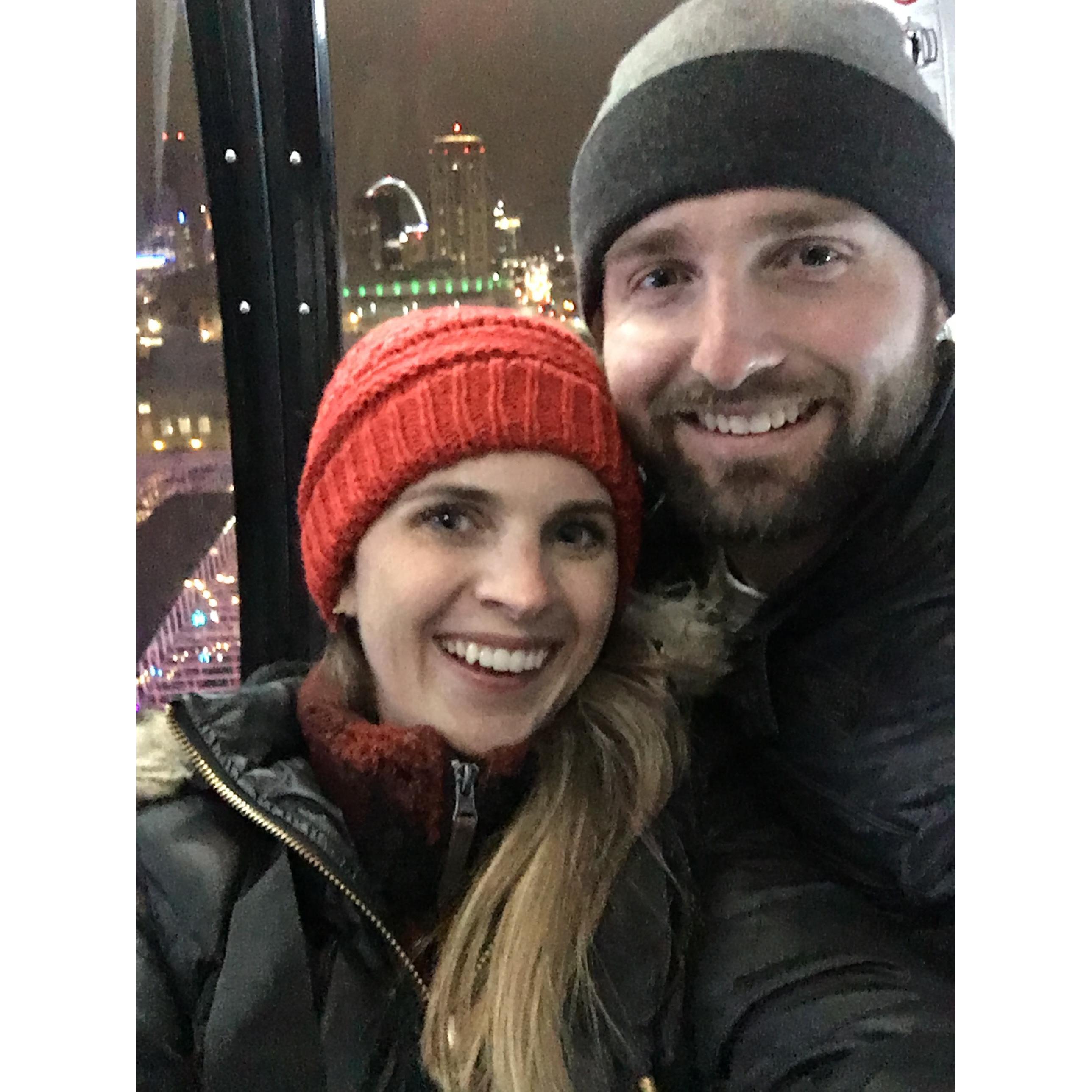 Can you tell Matt’s greatest fear is heights? Kristi snapped this photo of them in a glass car Ferris Wheel overlooking St. Louis City. Check out the St. Louis Arch in the background.