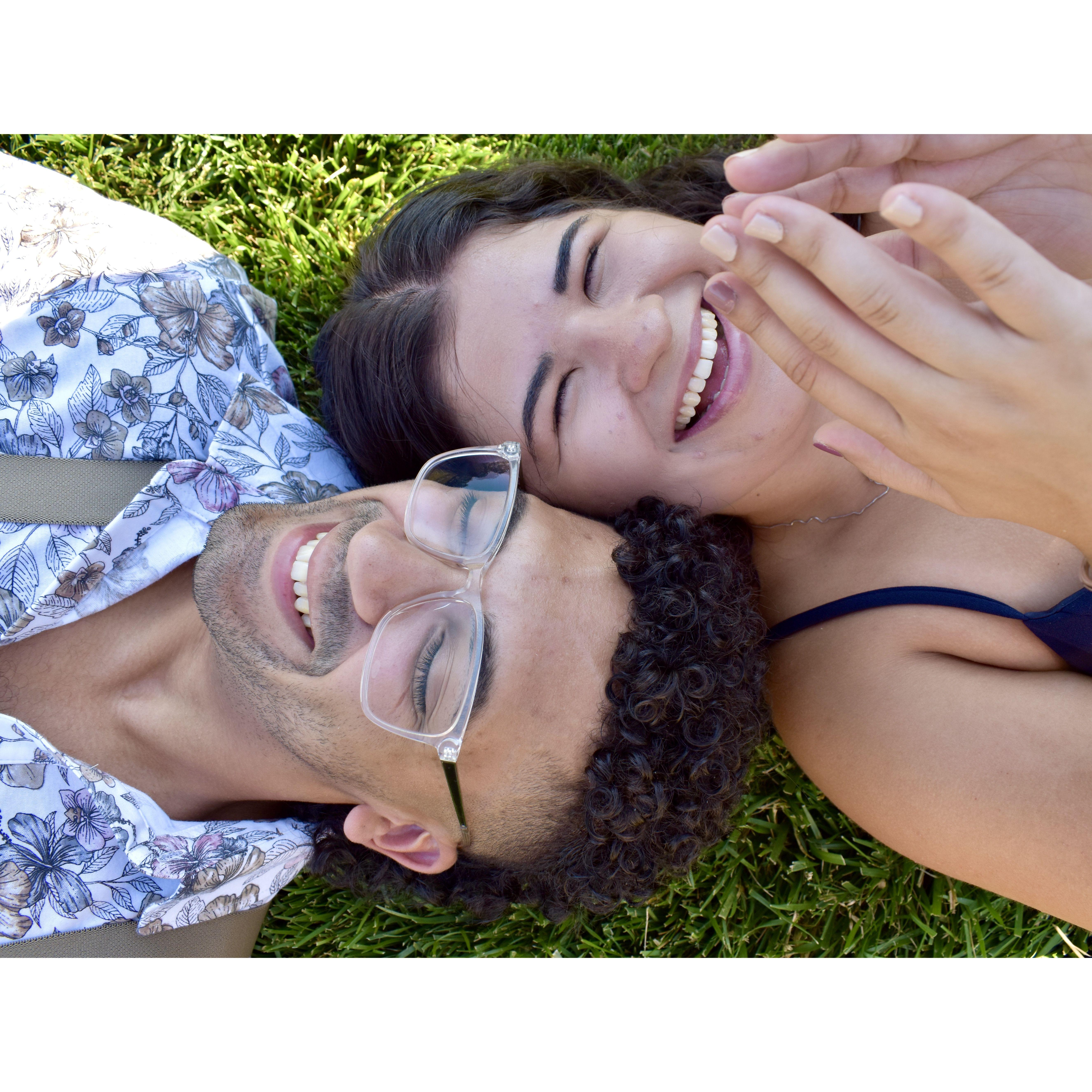Laughing because of the sun & sweat being in our eyes!