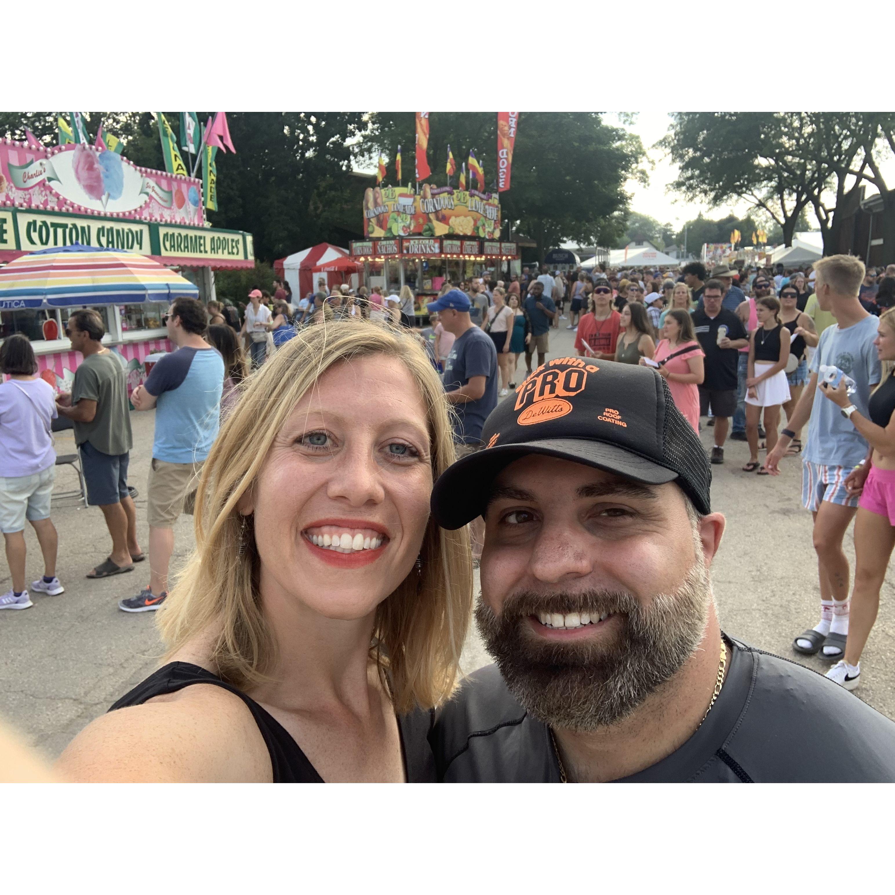 One of our early dates to the Wisconsin State Fair. The Marine's recruitment table convinced us to try their pull-up challenge. Turns out we're both competitive. Ask us who won :)
