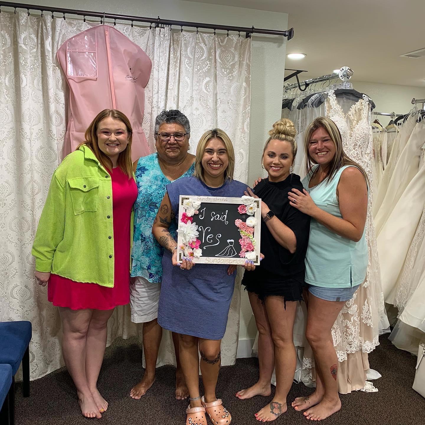 Got my dress!! 
From left to right: Helayna (the Maid of Honor), my Memaw, myself, my Aunt Abbie, and close family friend Jenna!