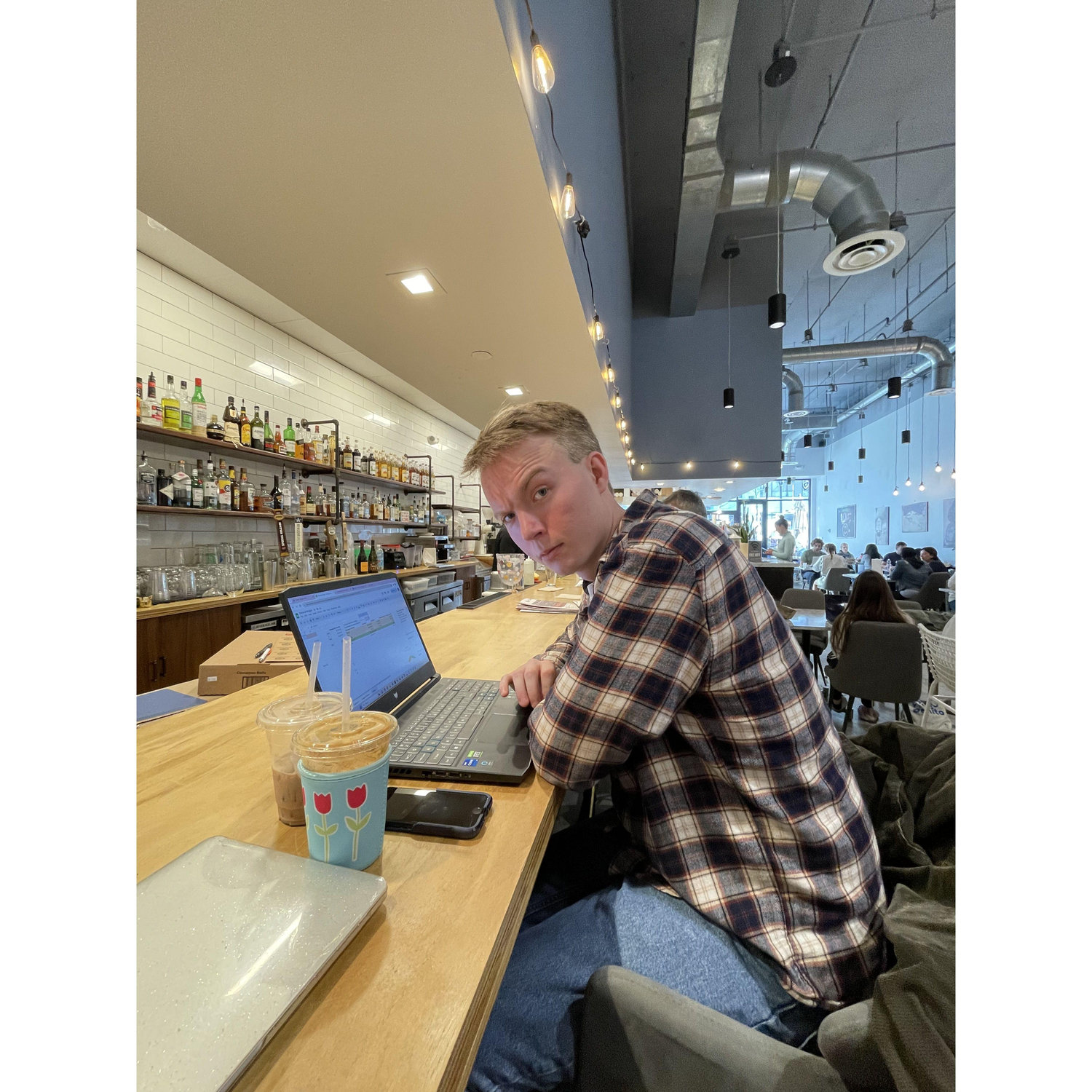 2024: Getting some wedding planning done at our favorite local coffeeshop