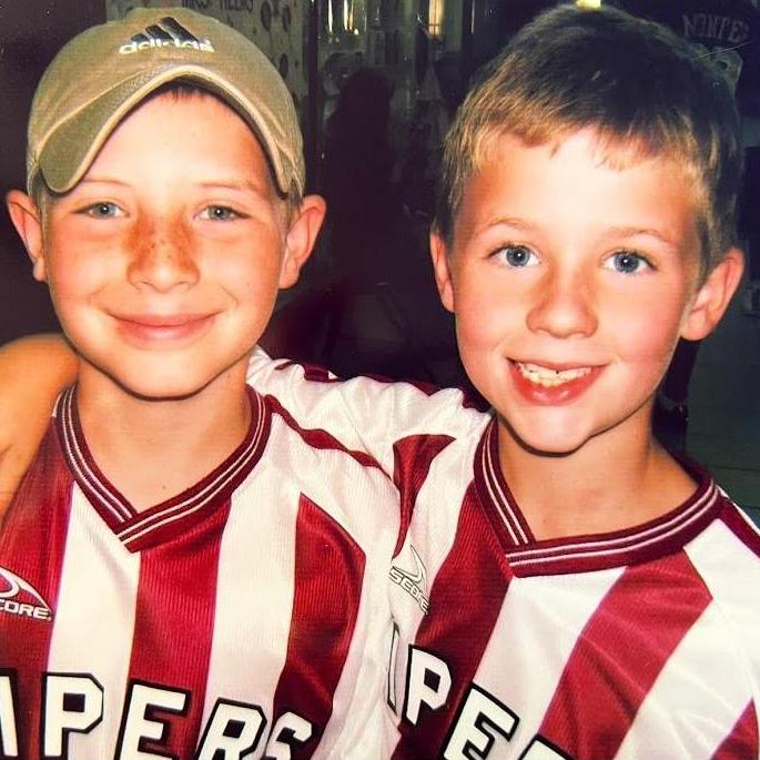 Zach and Adam in their rec soccer jerseys in elementary school!