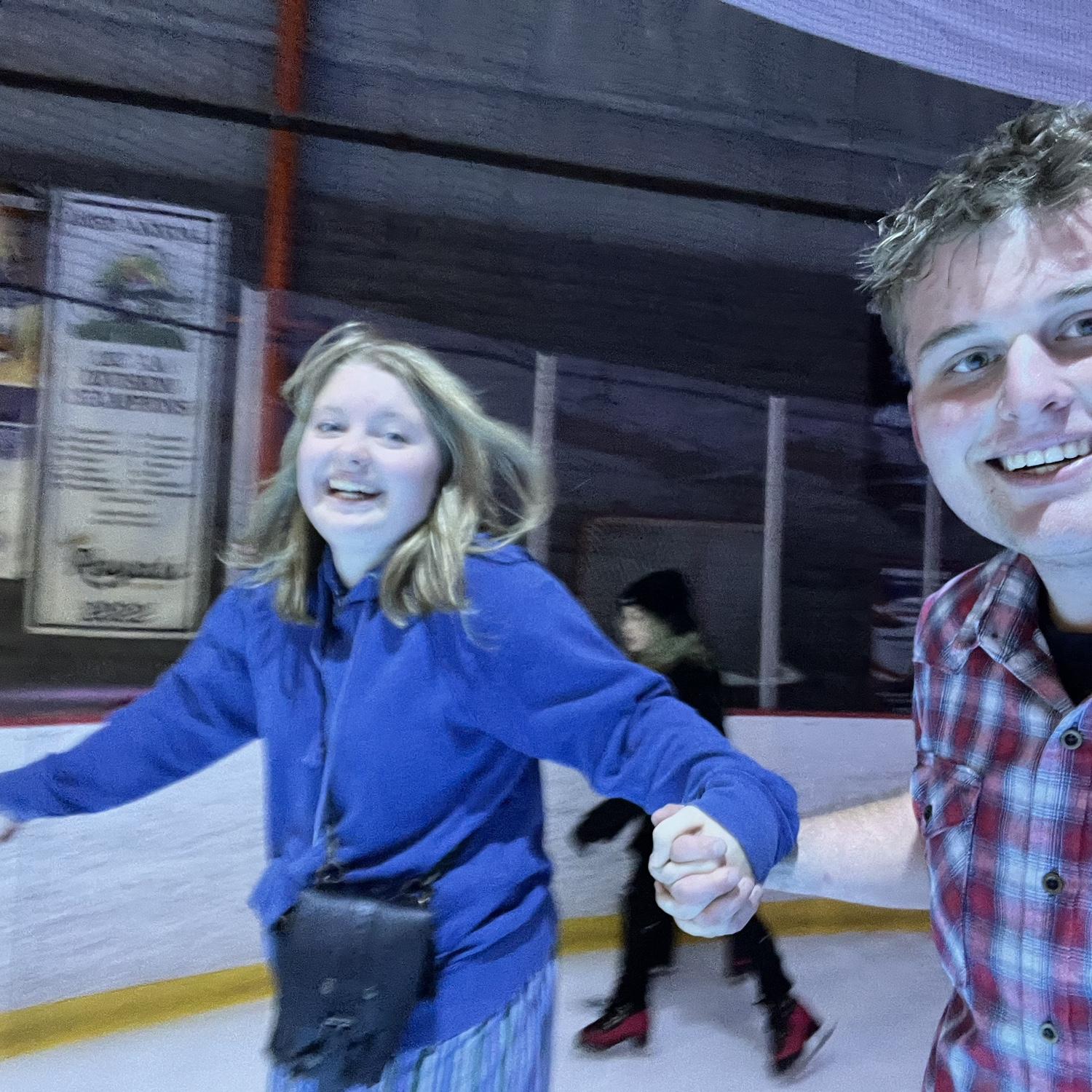 Anneliese teaching Taylor to ice skate.