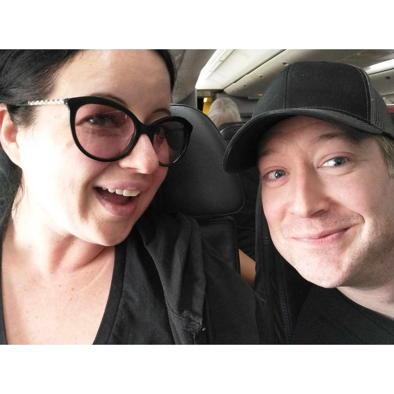 On the plane to Scotland in Aug. 2022. Andy knows he's going to propose, while Ally has no idea but is hopeful.