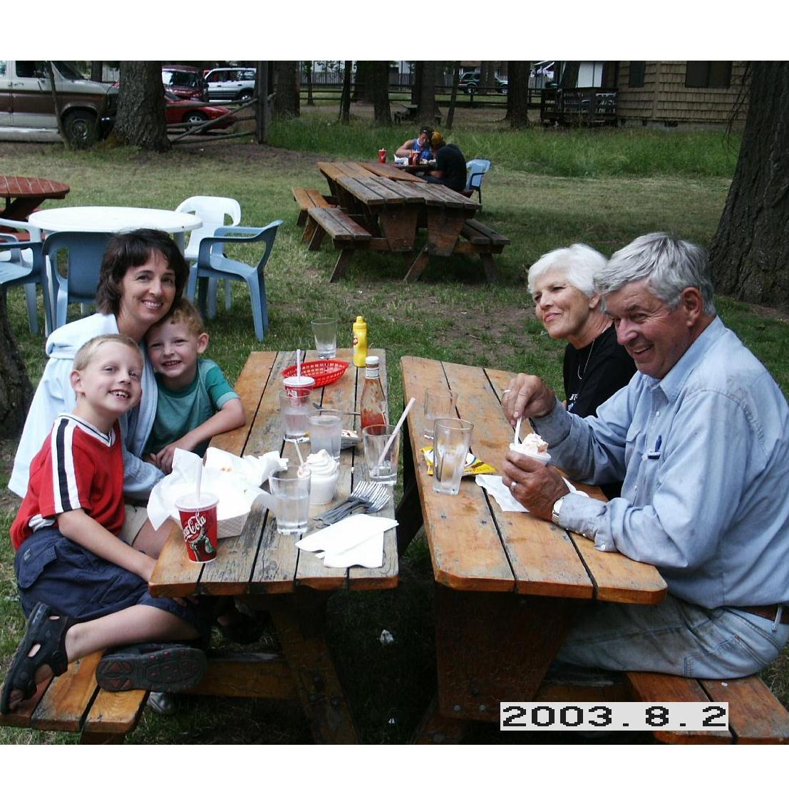 A sweet picnic portrait with Melanie, Anthony, David, Grandma Wieck, and Grandpa Wieck.