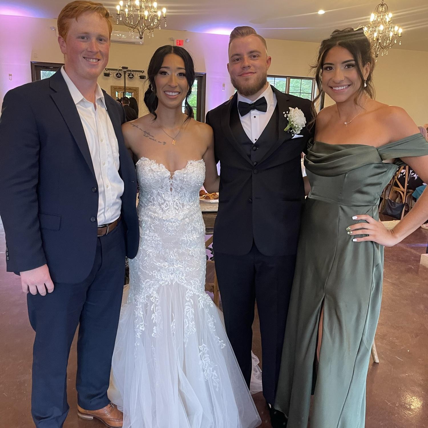 Us attending Kaitlyn's beautiful sisters wedding!