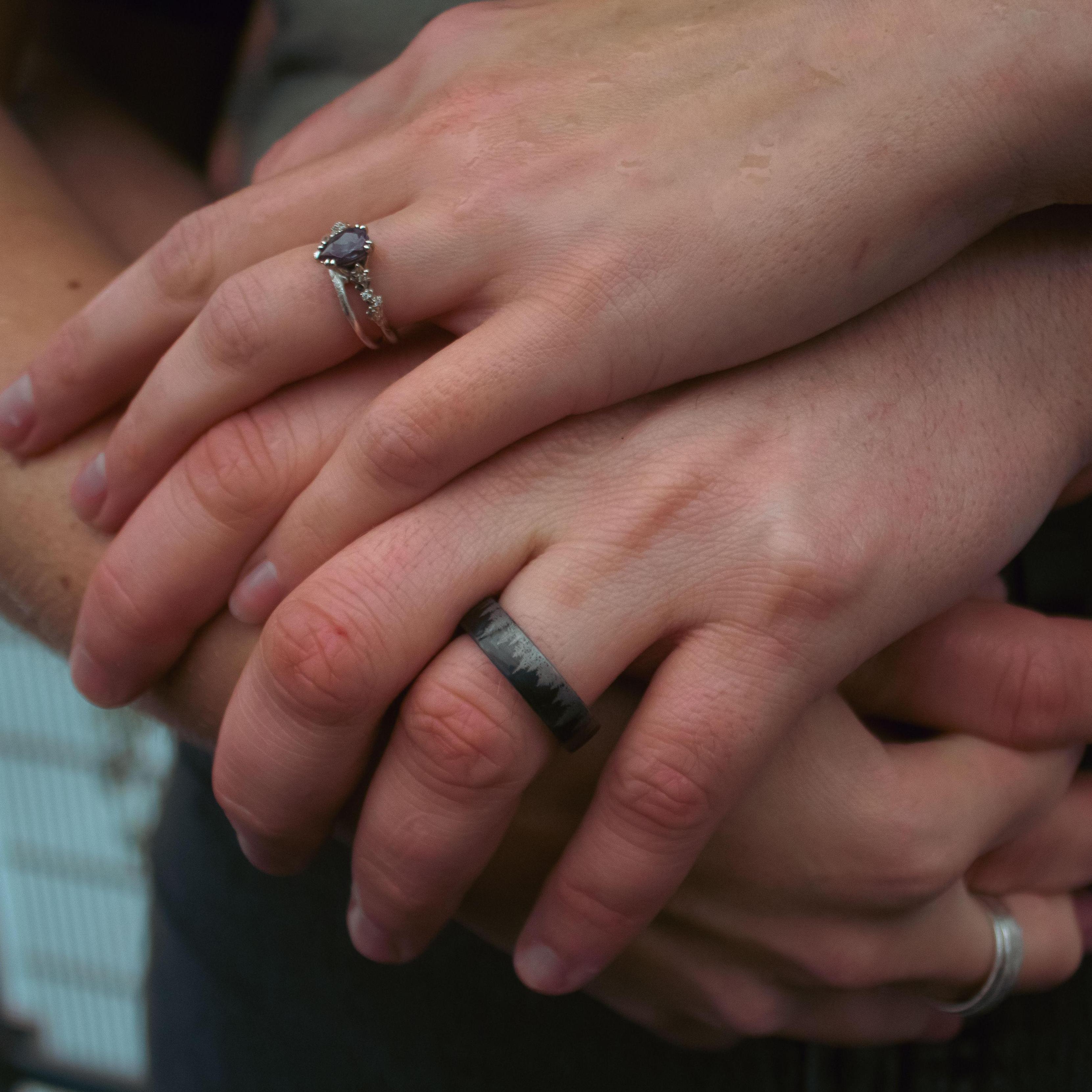 Couple's shoot at the VMFA showing our wedding bands (November 2022).