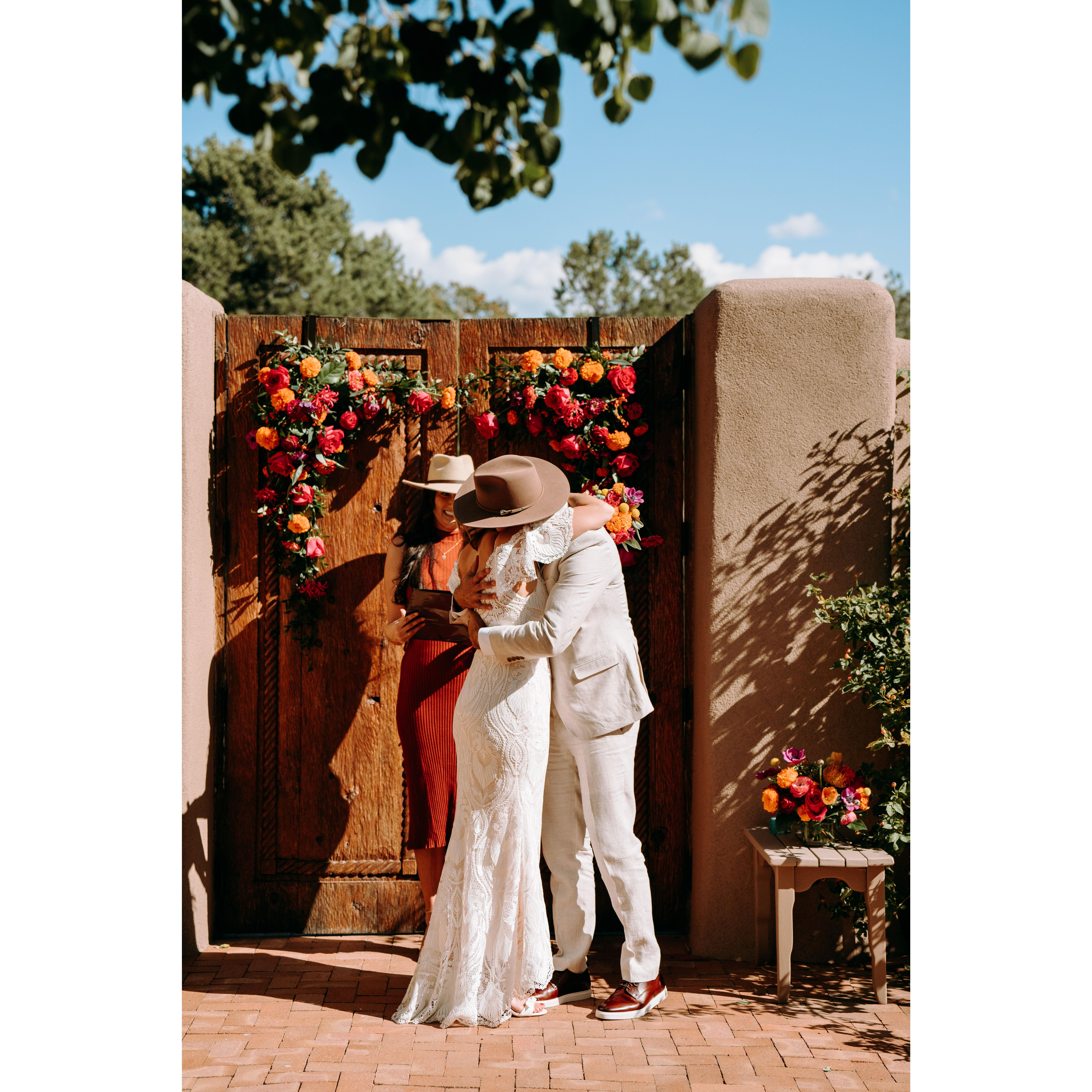 Vow ceremony - Jenn and Shae's first embrace as Mr. and Mrs.
