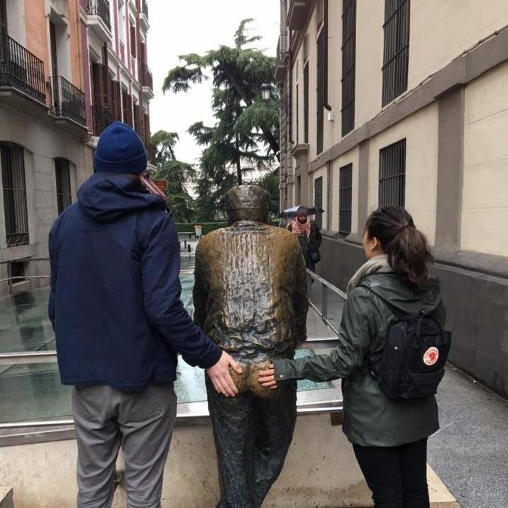 February 2017: Getting intimate with a statue in Madrid, Spain.