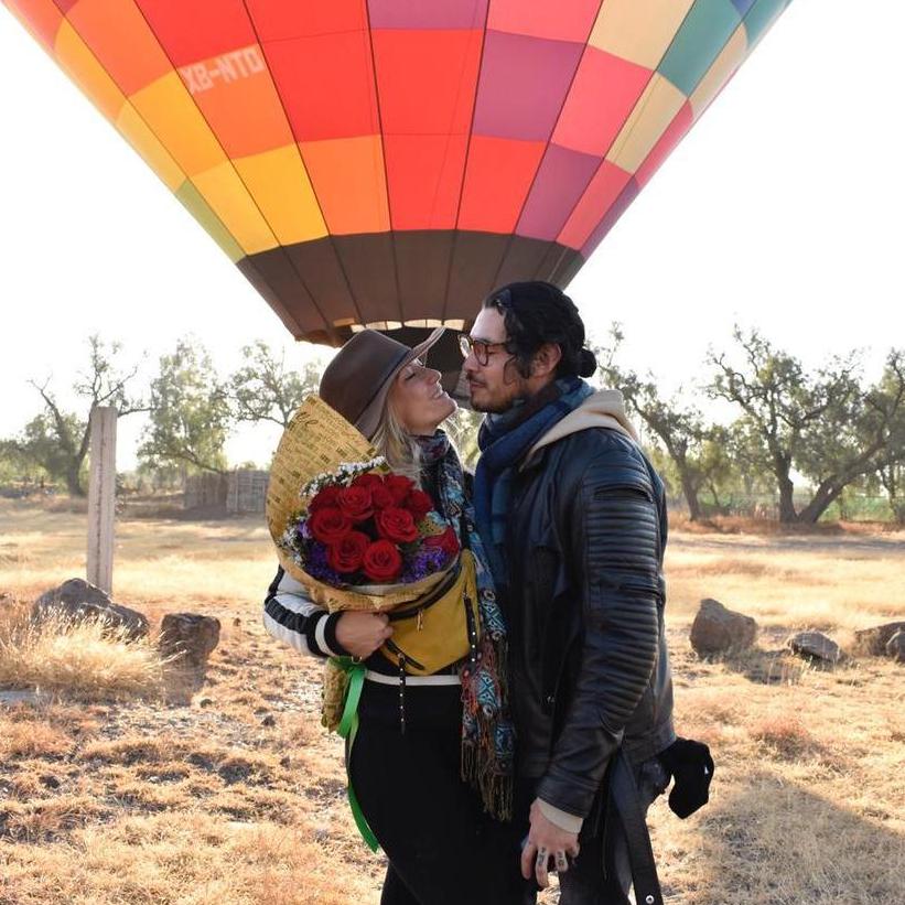 It was a dream of mine to ride in a hot air balloon.  Little did I know he would have roses waiting for me at the end of it!  We love seeing the Teotihuacan pyramids this way!