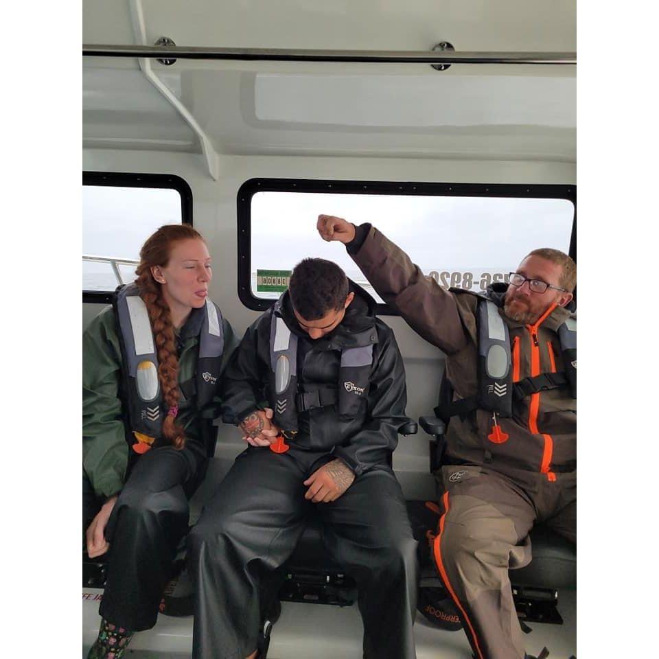 My dad and I poking fun at a sleepy Josh during a tuna charter